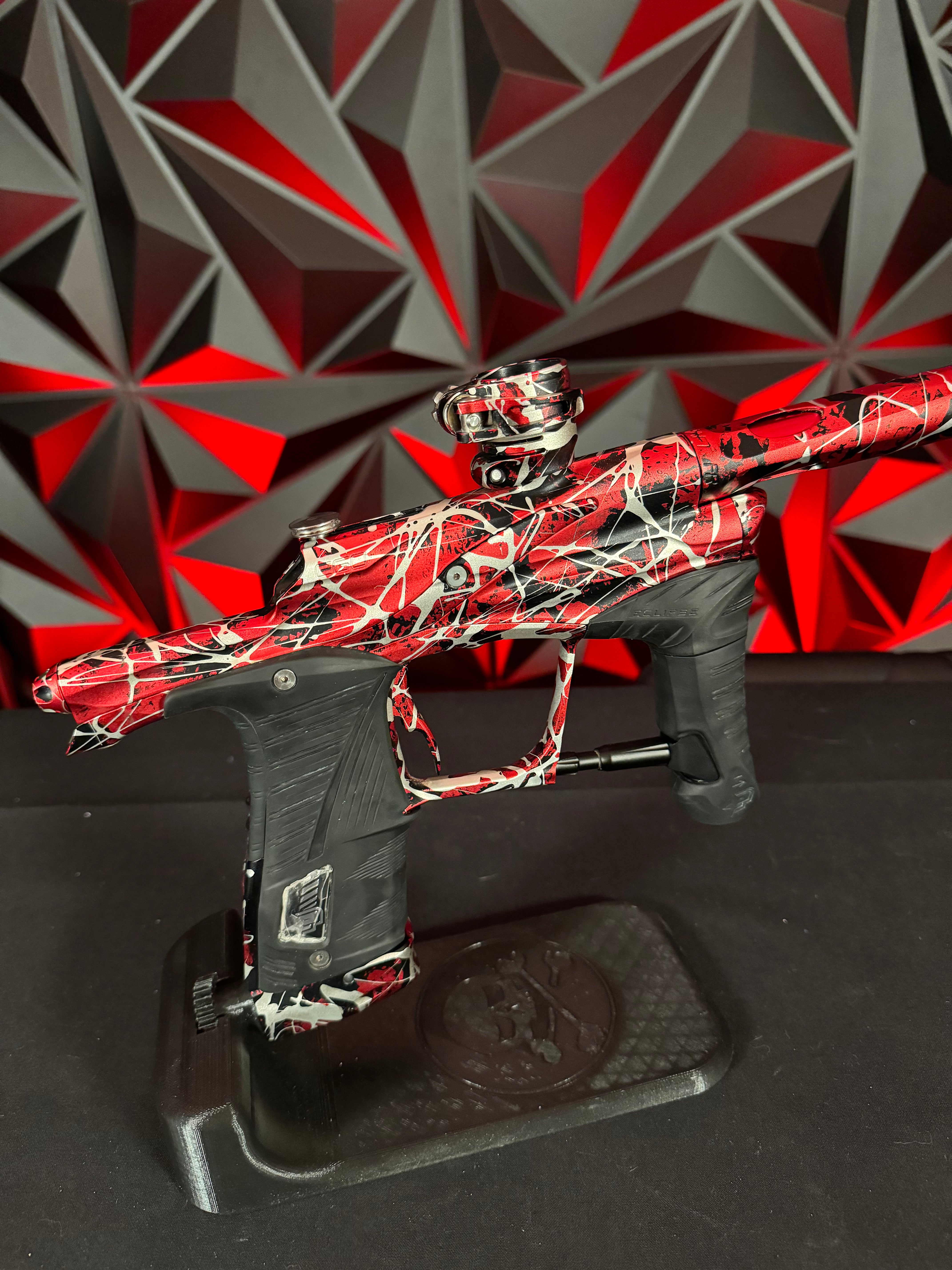 Used Planet Eclipse LV1 Paintball Gun - Red/Black/Silver Splash