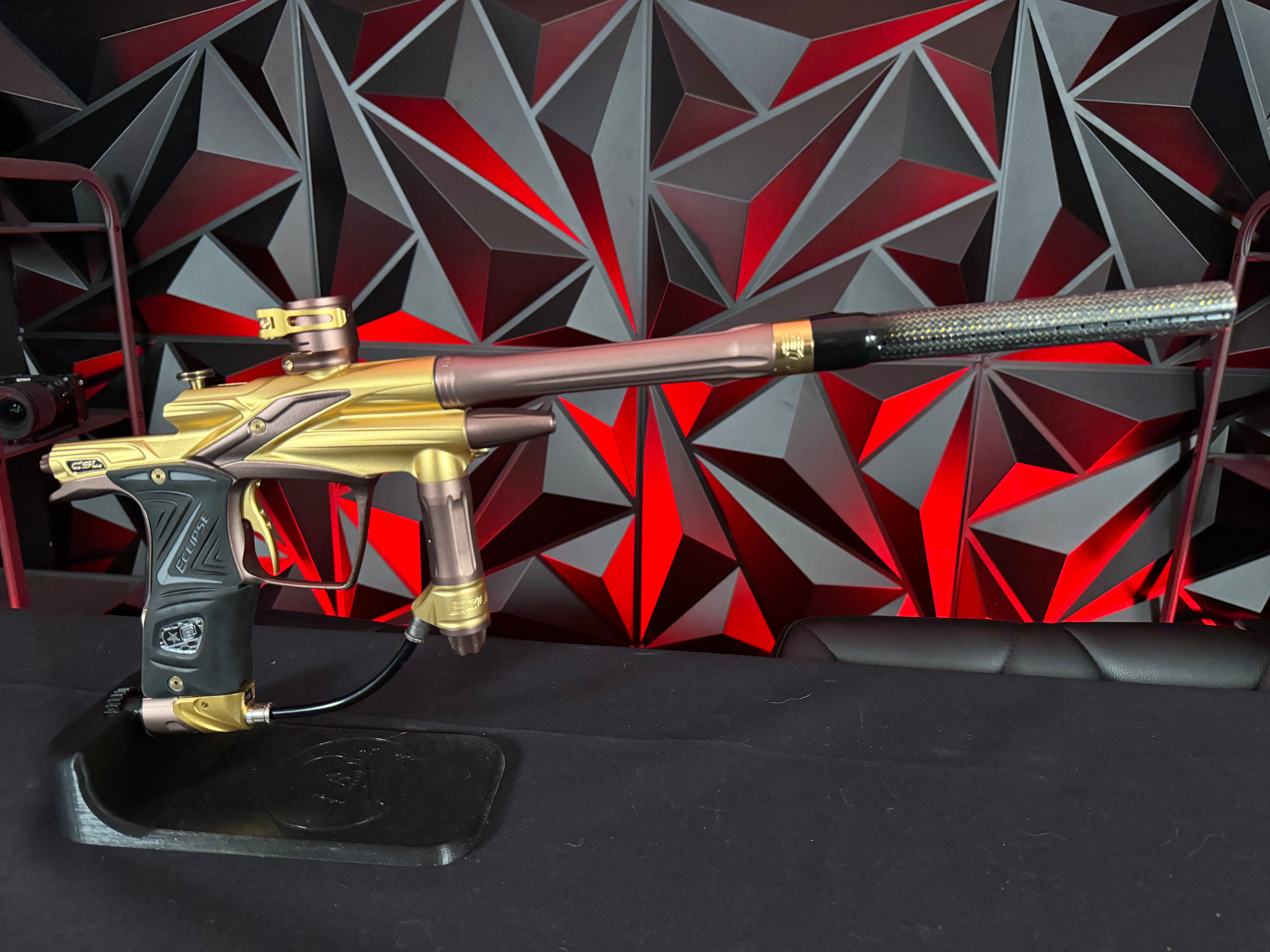 Used Planet Eclipse CSL Paintball Gun - Gold/Bronze w/14" & 16" Matching Carbon Fiber Tips, Blade and Scythe Trigger, & All 3 Barrel Backs