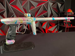 Used DLX Luxe ICE Paintball Gun - Multi-Color Splash w/ 4 Freak Inserts