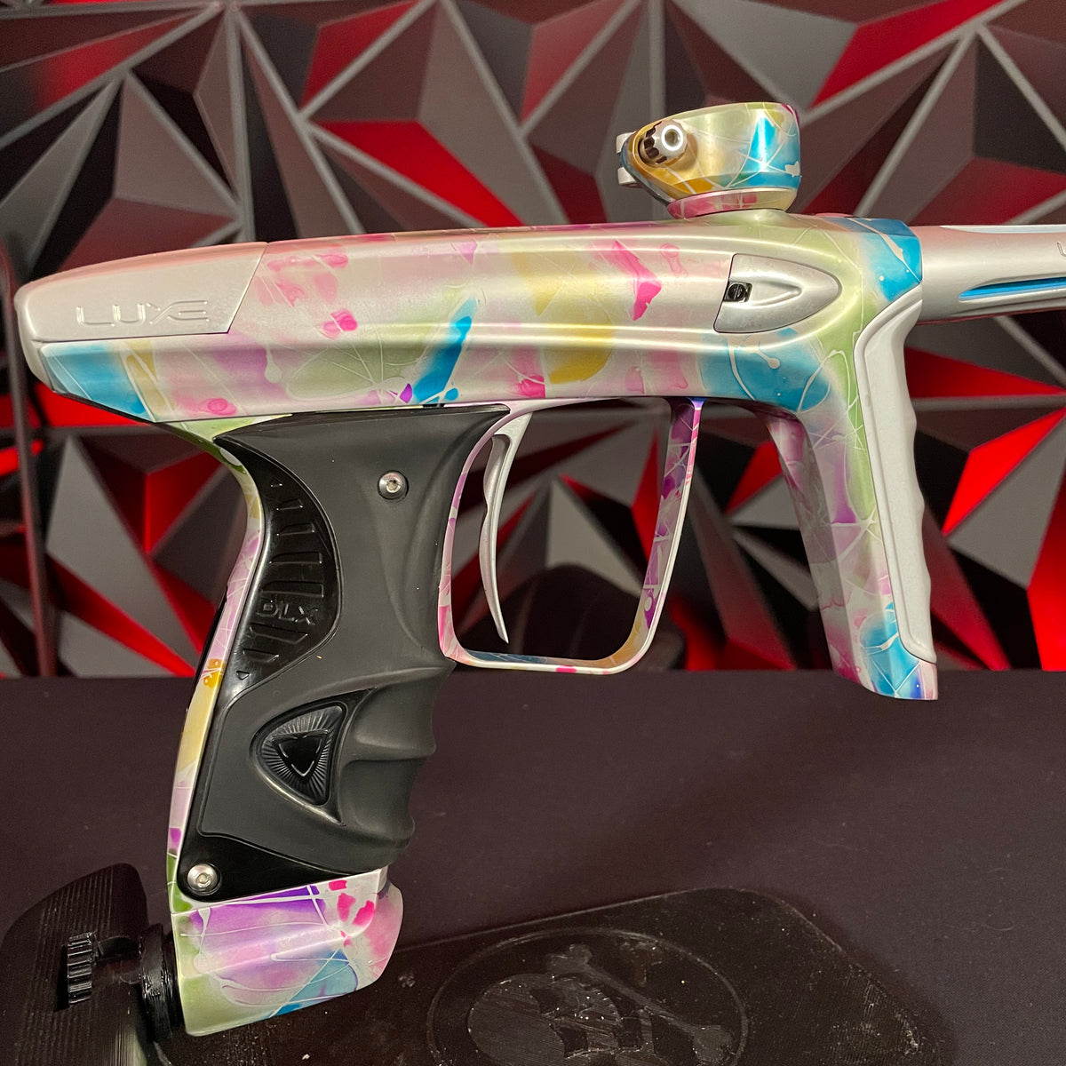 Used DLX Luxe ICE Paintball Gun - Multi-Color Splash w/ 4 Freak Insert