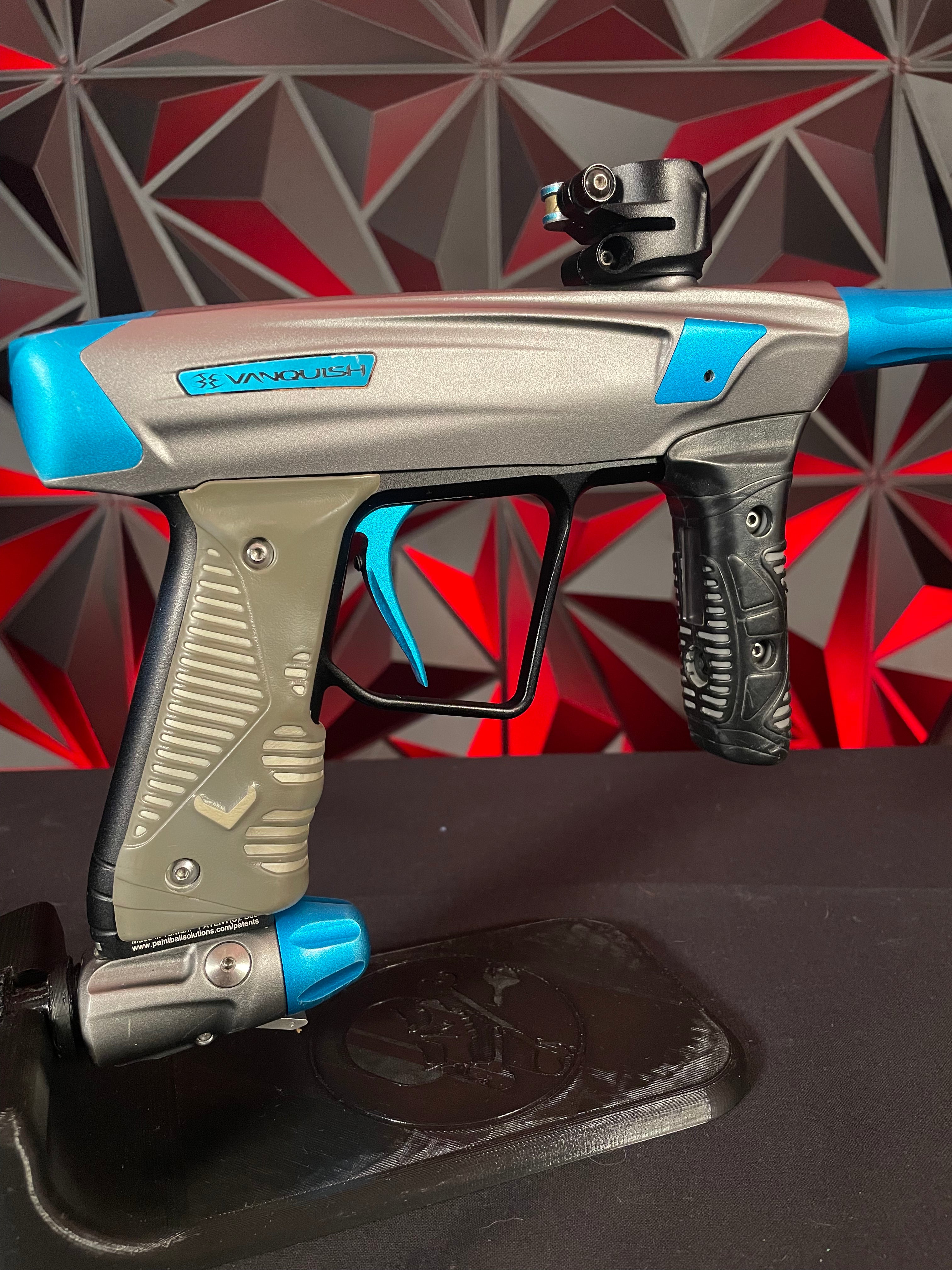 Used Empire Vanquish GT Paintball Marker - Silver/Blue w/ 4 Barrel Backs