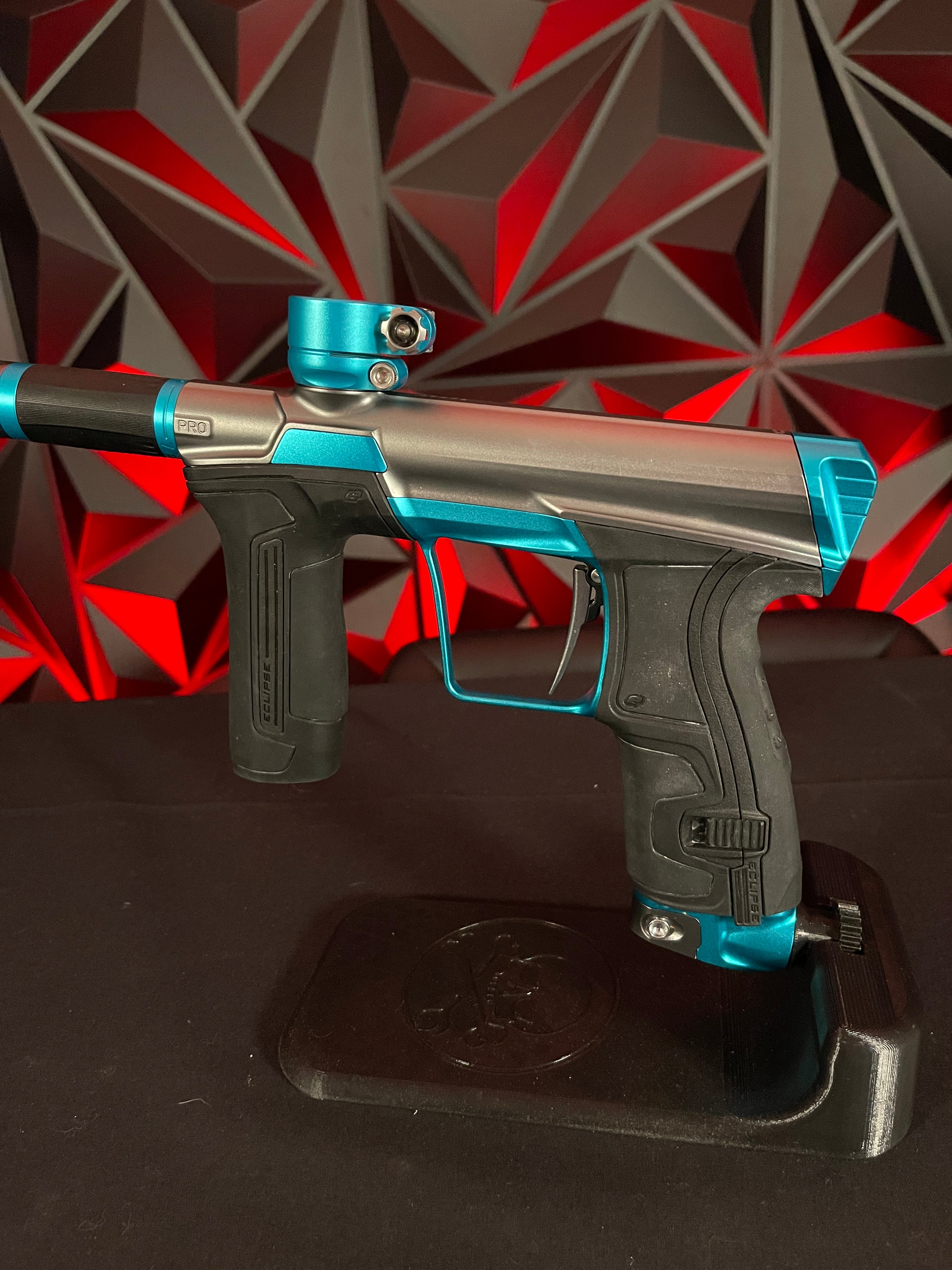 Used Planet Eclipse CS2 Pro Paintball Gun - Grey/Teal w/3 FL Back