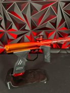 Used Dye DSR Paintball Gun - Orange/Red Fade (Tequila Sunrise) w/Flex Face Bolt/Flex Flow Can, Carbon IC Barrel