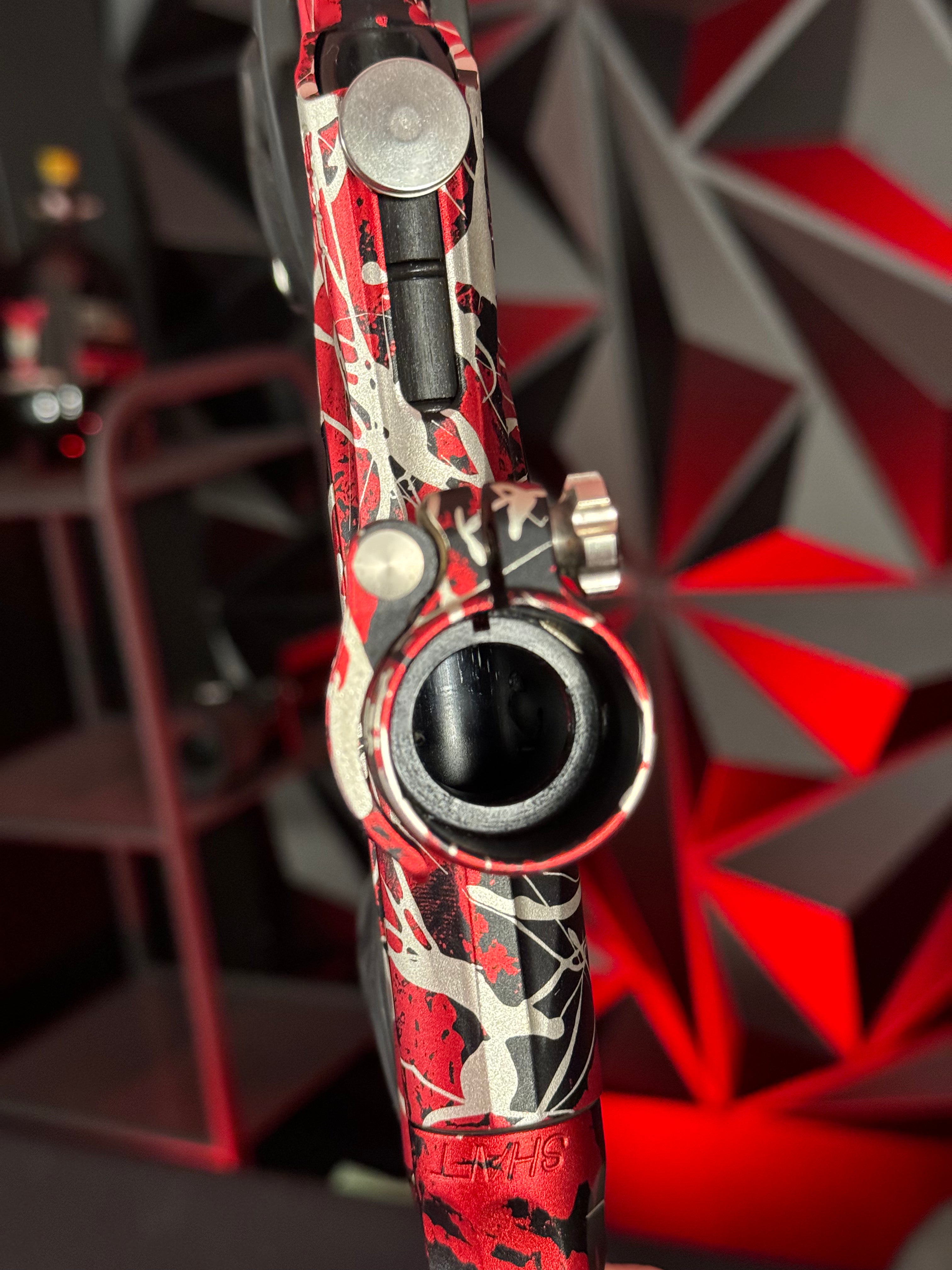 Used Planet Eclipse LV1 Paintball Gun - Red/Black/Silver Splash