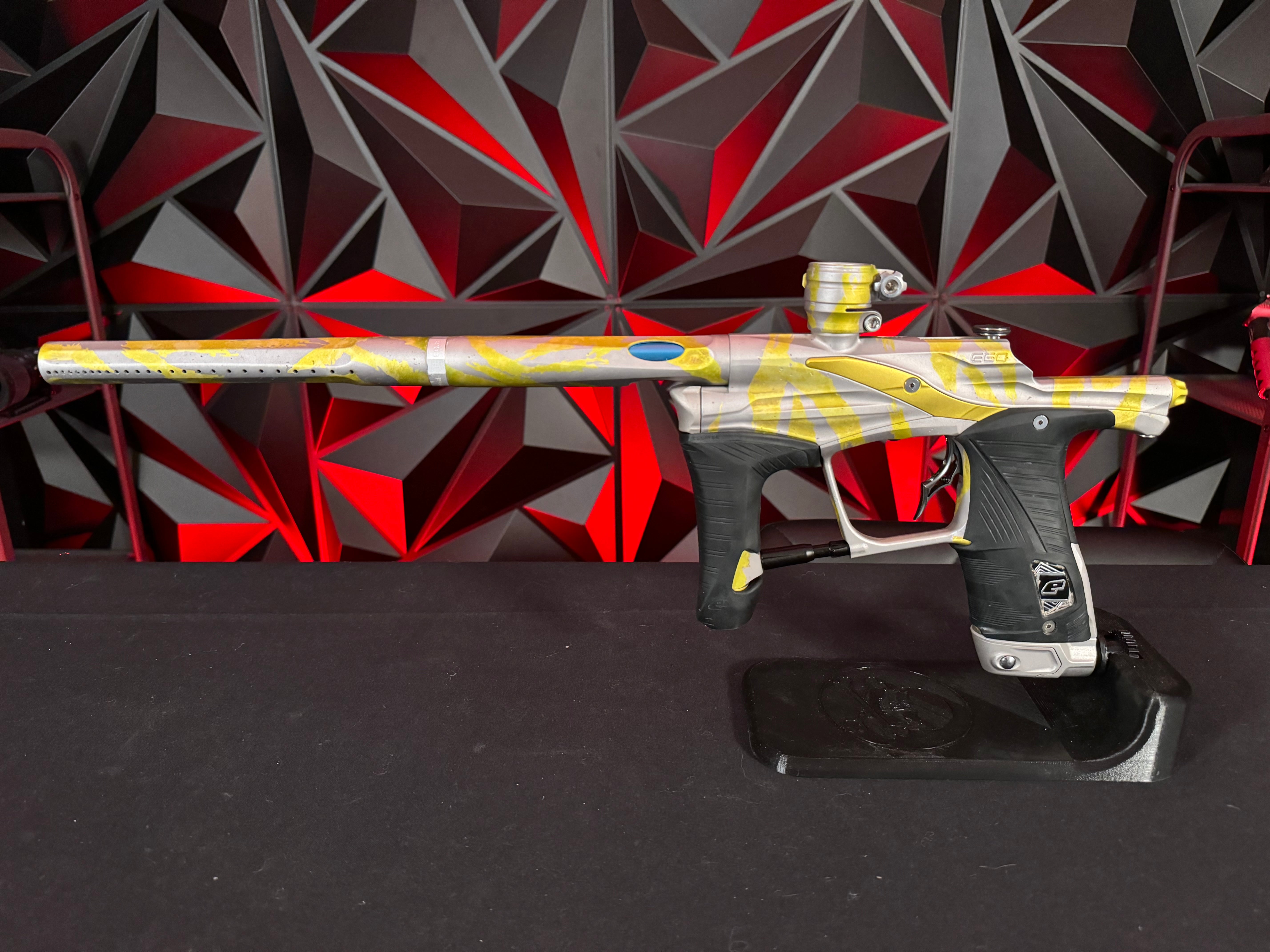 Used Planet Eclipse LV1.1 Paintball Gun - Custom Anno Silver/Yellow Tiger w/Deuce Trigger, TechT Bolt, White & Black Grip Kit