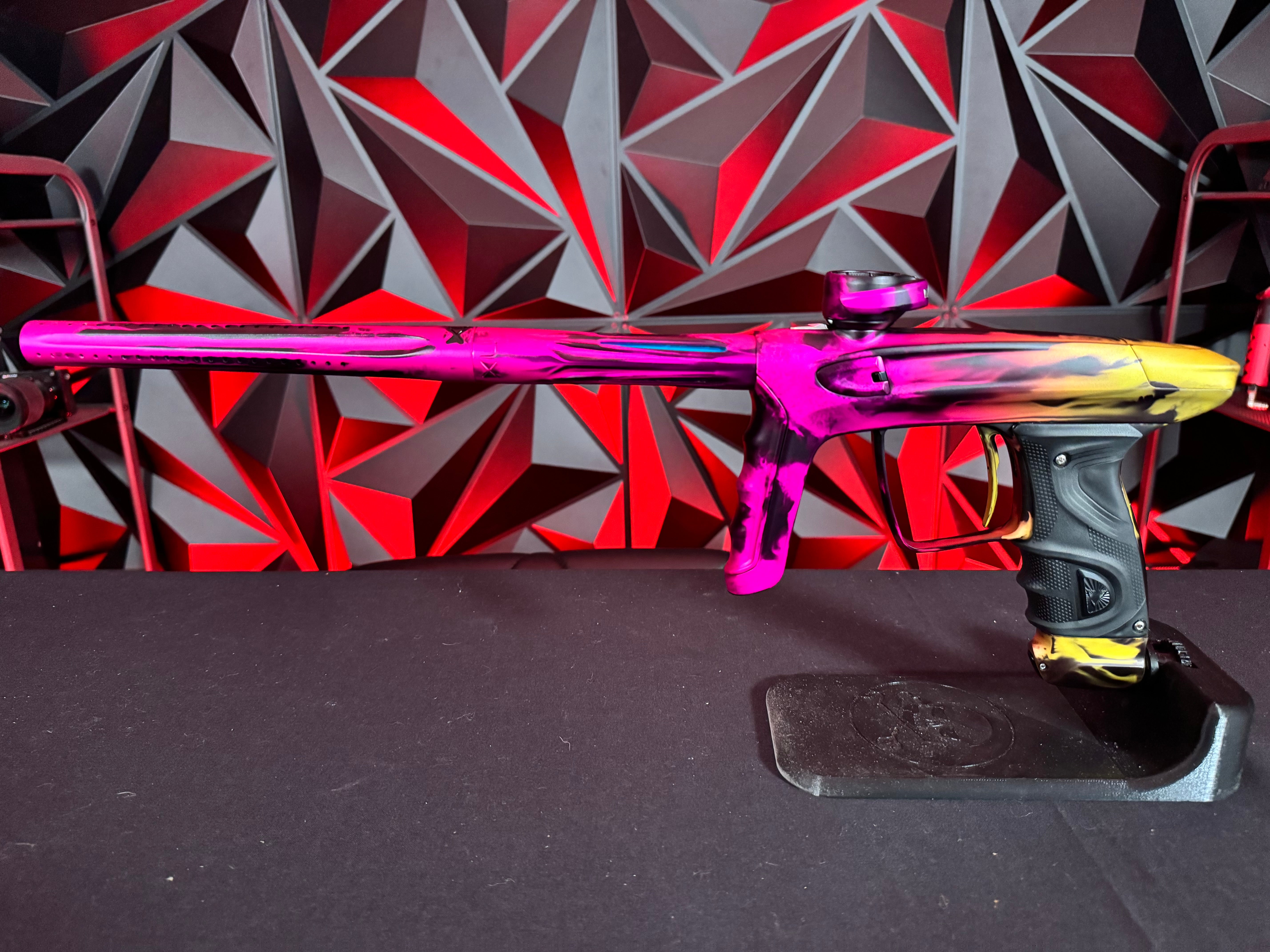 Used DLX Luxe TM40 Paintball Gun - LE Dust Pink/Yellow Smear