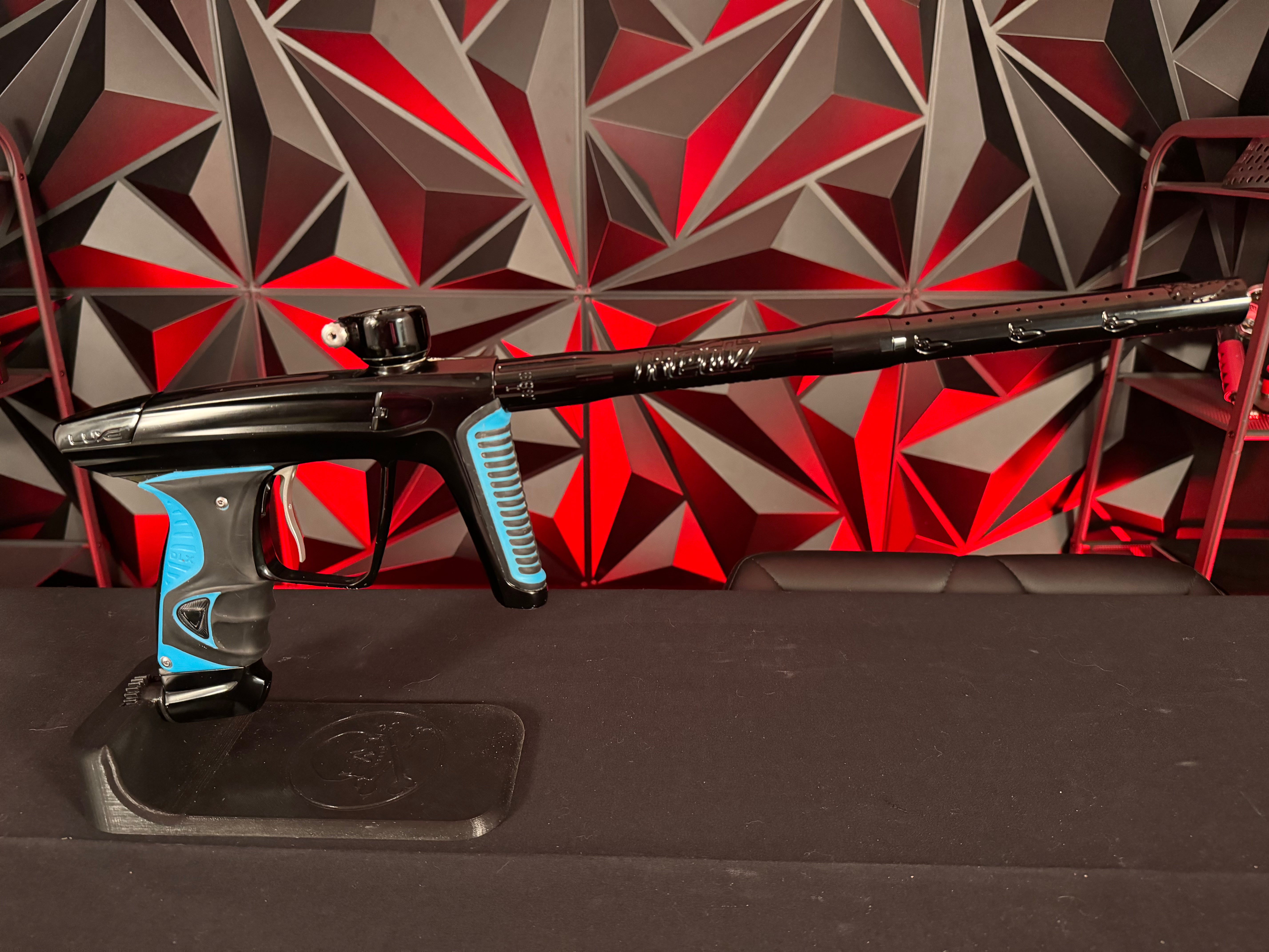 Used DLX Luxe X Paintball Gun - Black w/ Blue Grips