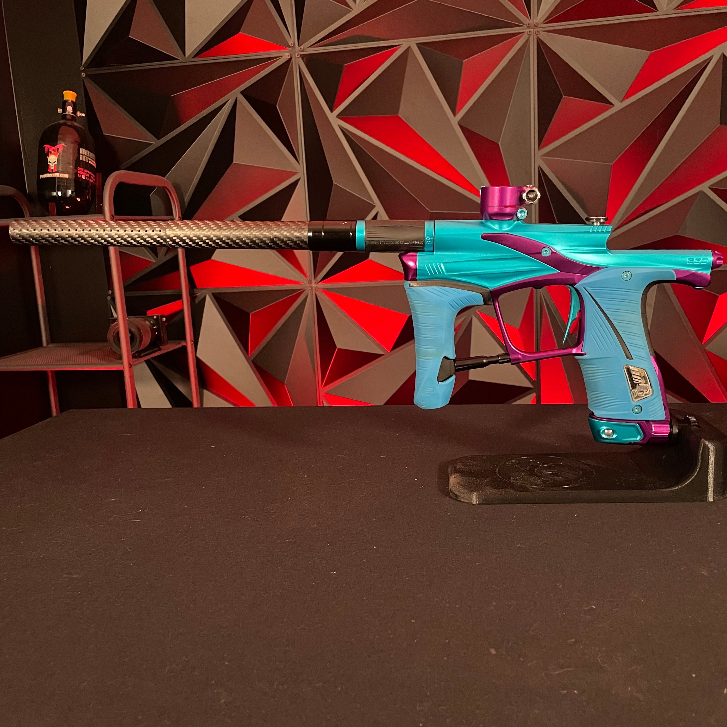 Used Planet Eclipse LV1.6 Paintball Gun - Teal/Purple w/Blue Grip Kit