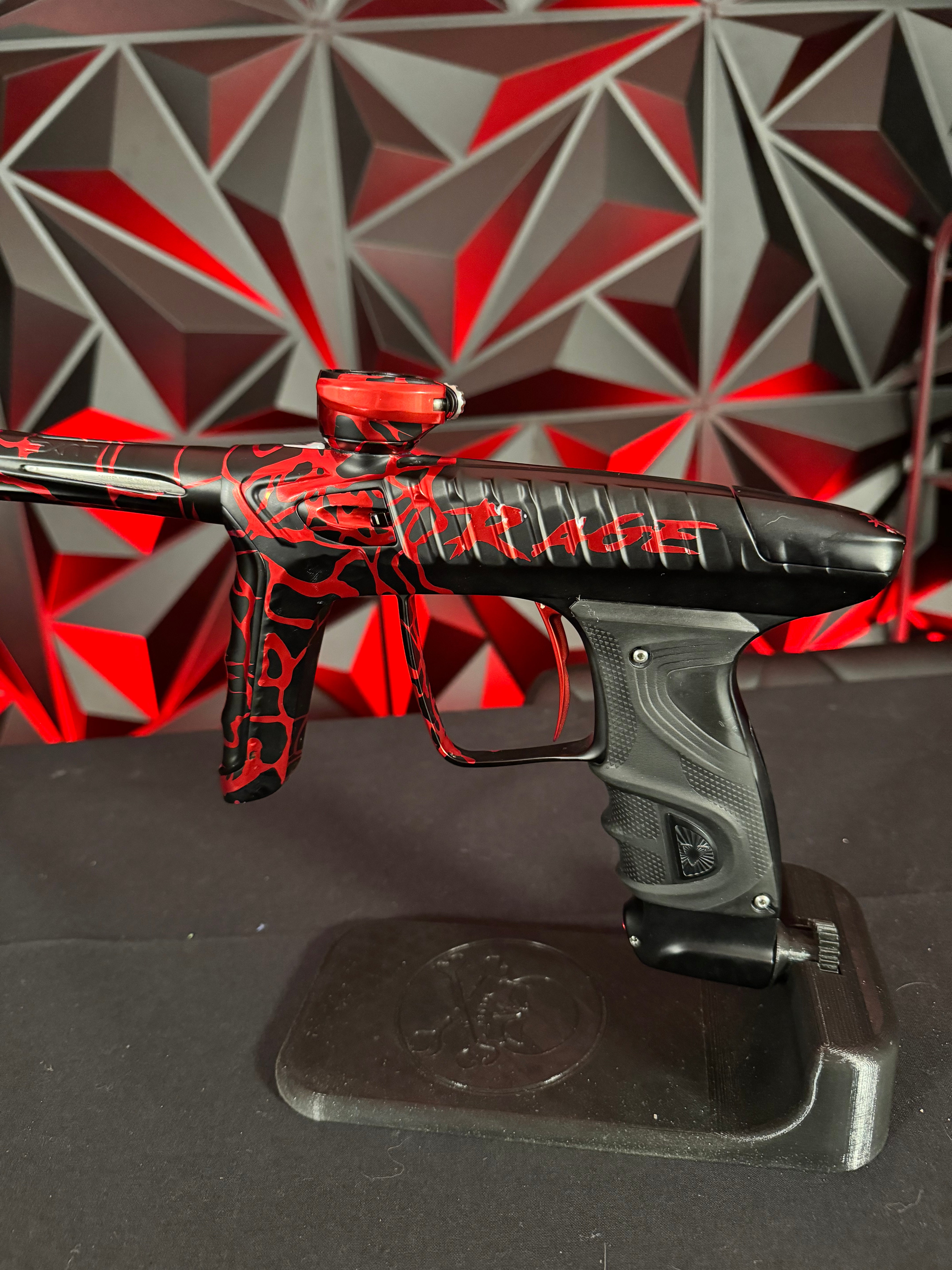 Used DLX LUXE "Project" TM40 Paintball Gun - Rage Black/Red Splash