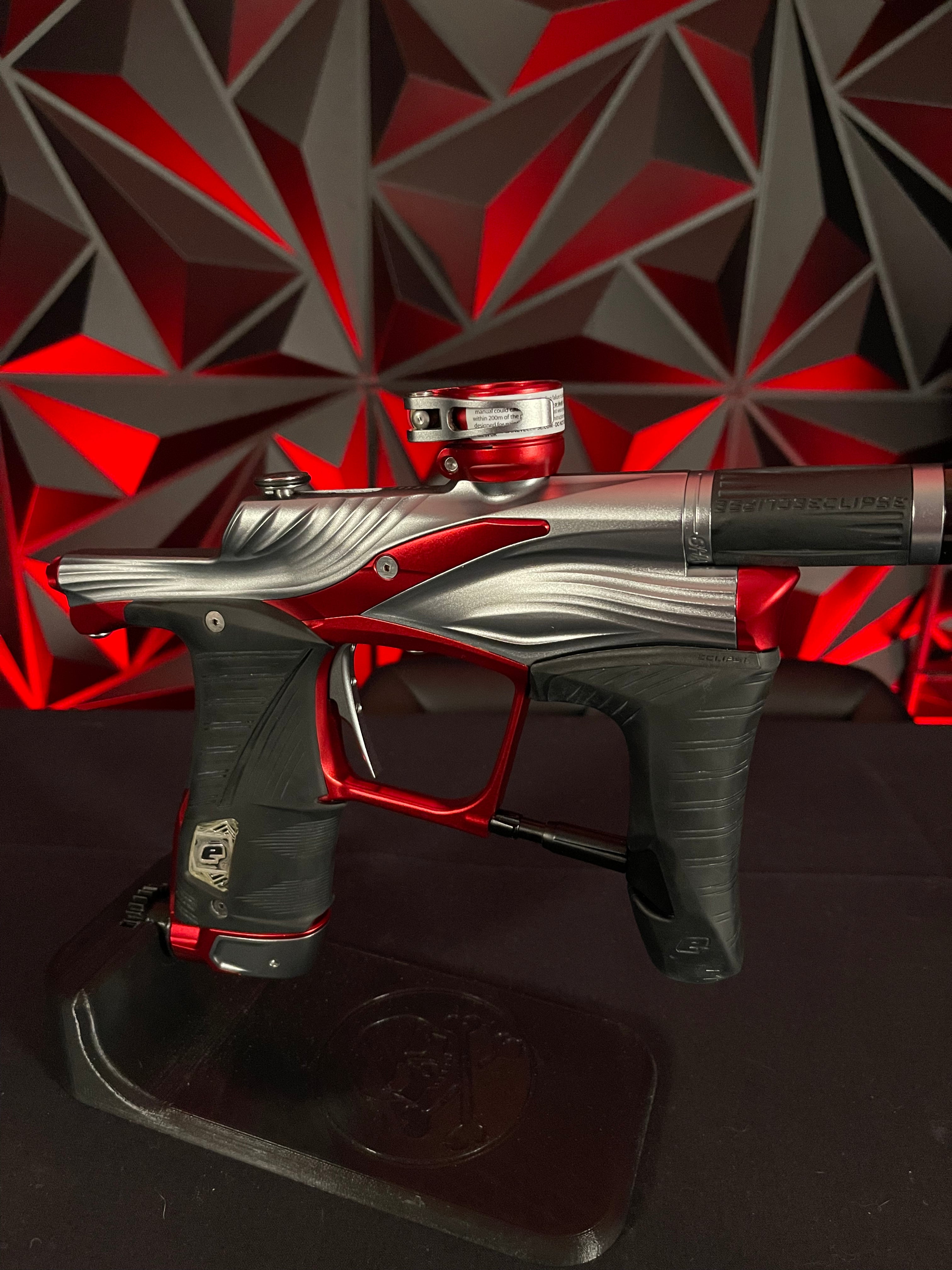 Used Planet Eclipse LV1.6 Paintball Gun - Teahupo Silver/Red w/Deuce Trigger, SSC Bolt, SSC Spare Parts Kit