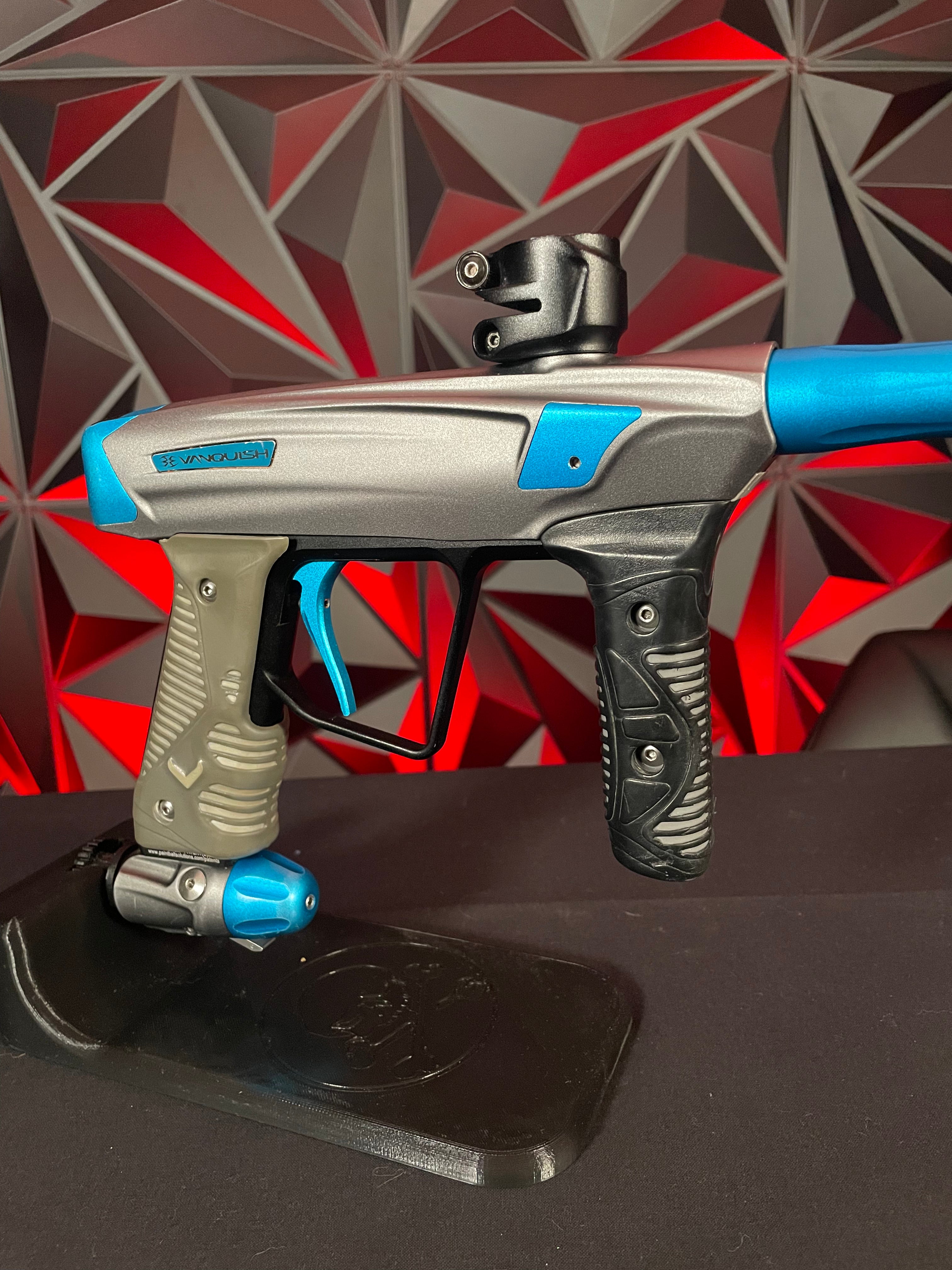 Used Empire Vanquish GT Paintball Marker - Silver/Blue w/ 4 Barrel Backs