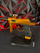 Used DLX Luxe 1.5 Paintball Gun - Polished Orange/Black w/2.0 Bolt