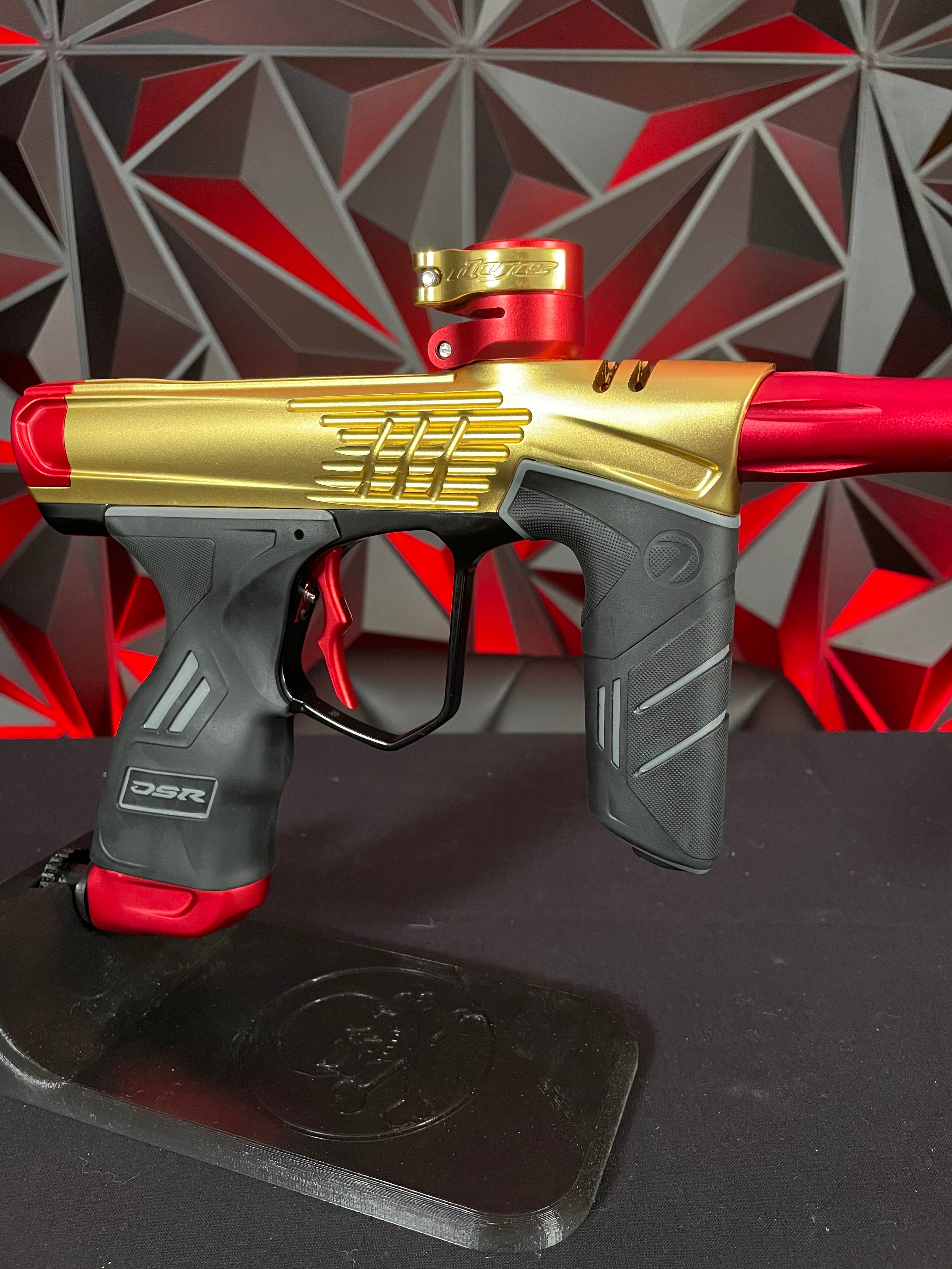 Used Dye DSR+ Paintball Gun - ICON Edition Gold/Red w/ IM Pro Kit