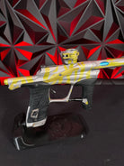 Used Planet Eclipse LV1.1 Paintball Gun - Custom Anno Silver/Yellow Tiger w/Deuce Trigger, TechT Bolt, White & Black Grip Kit