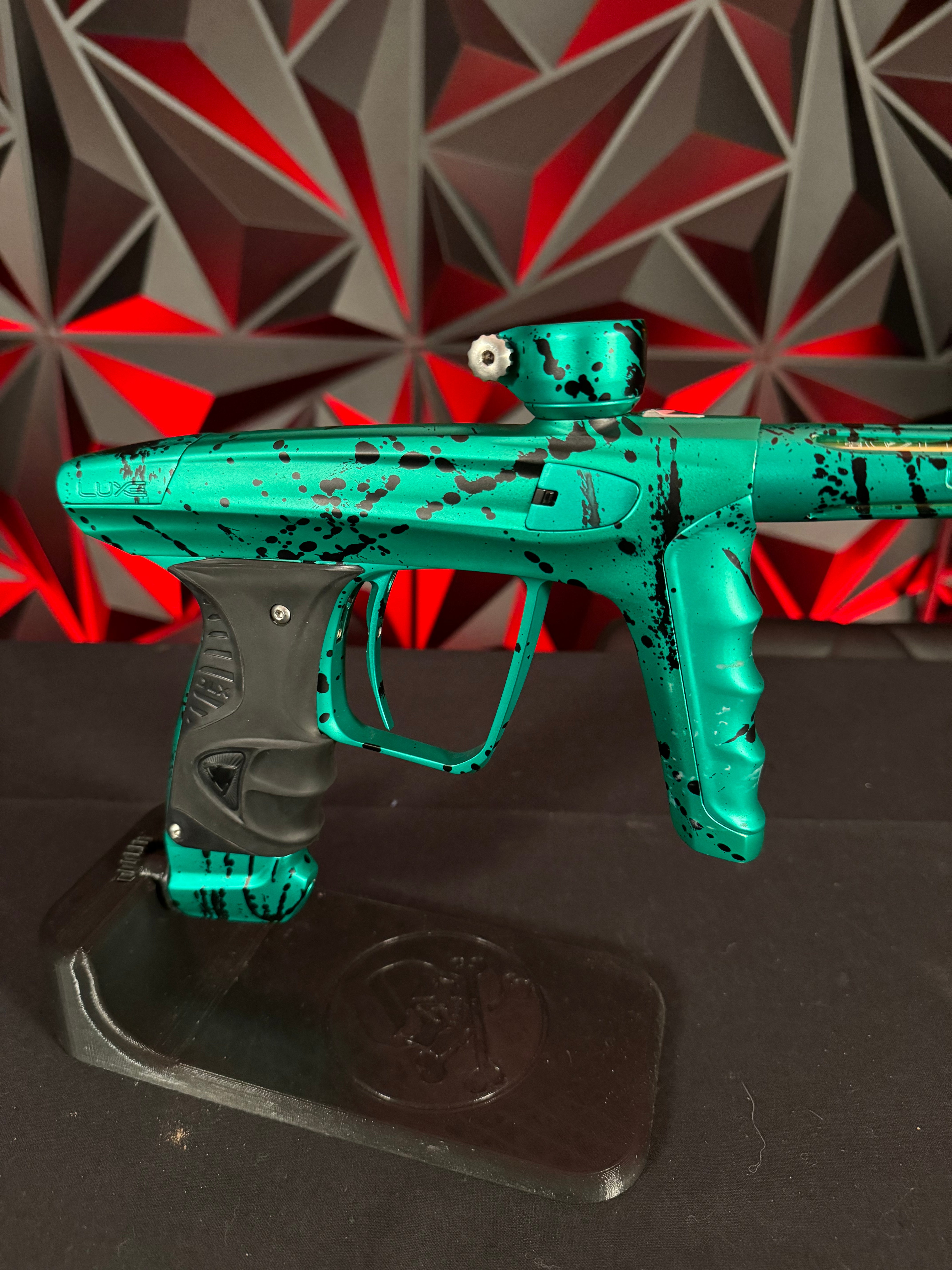 Used DLX Luxe X Paintball Gun - Green Splash