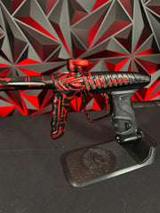 Used DLX LUXE "Project" TM40 Paintball Gun - Rage Black/Red Splash