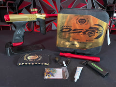 Used Dye DSR+ Paintball Gun - ICON Edition Gold/Red w/ IM Pro Kit