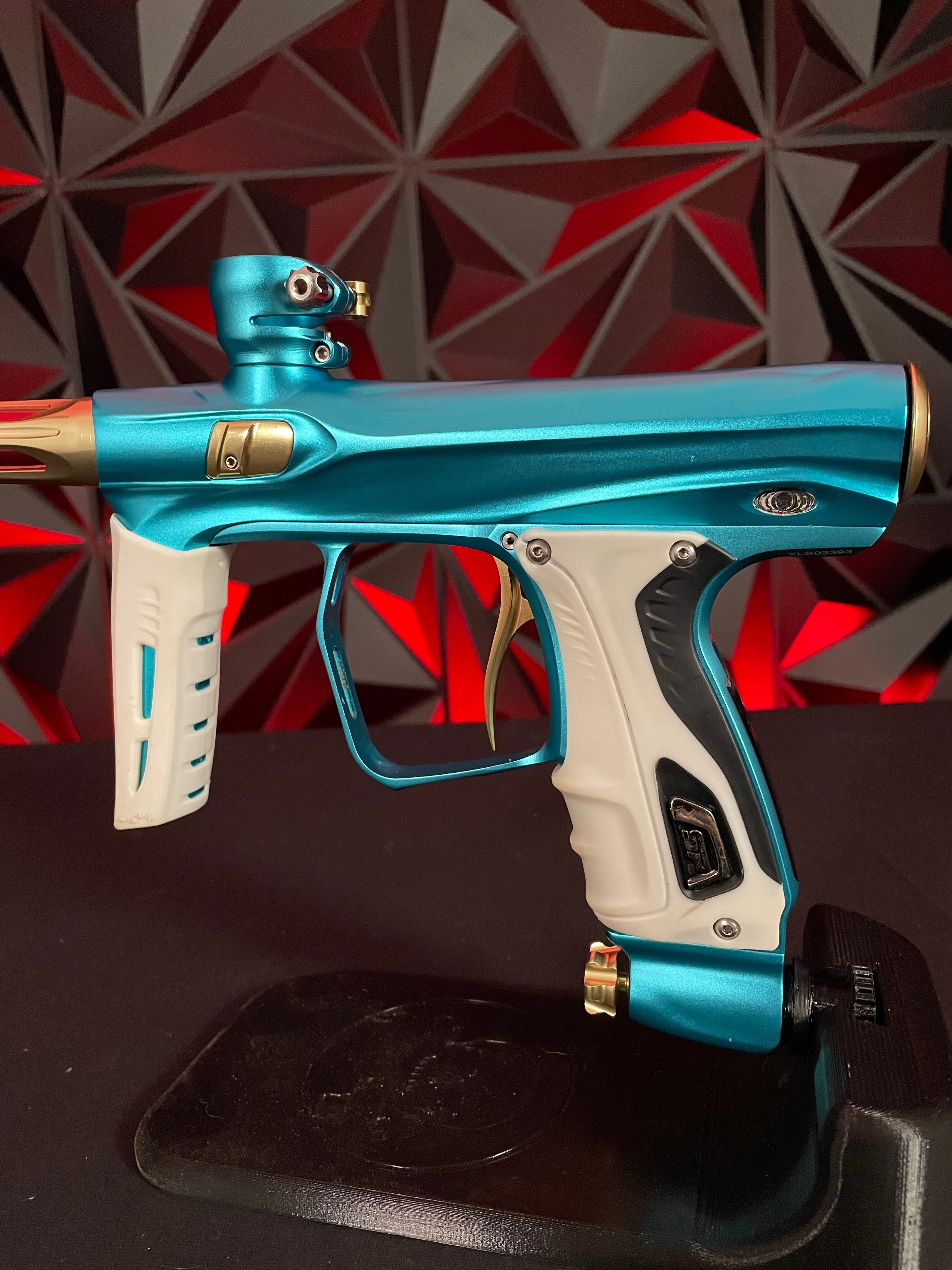 Used Shocker XLS Paintball Gun - Dust Teal / Polished Gold