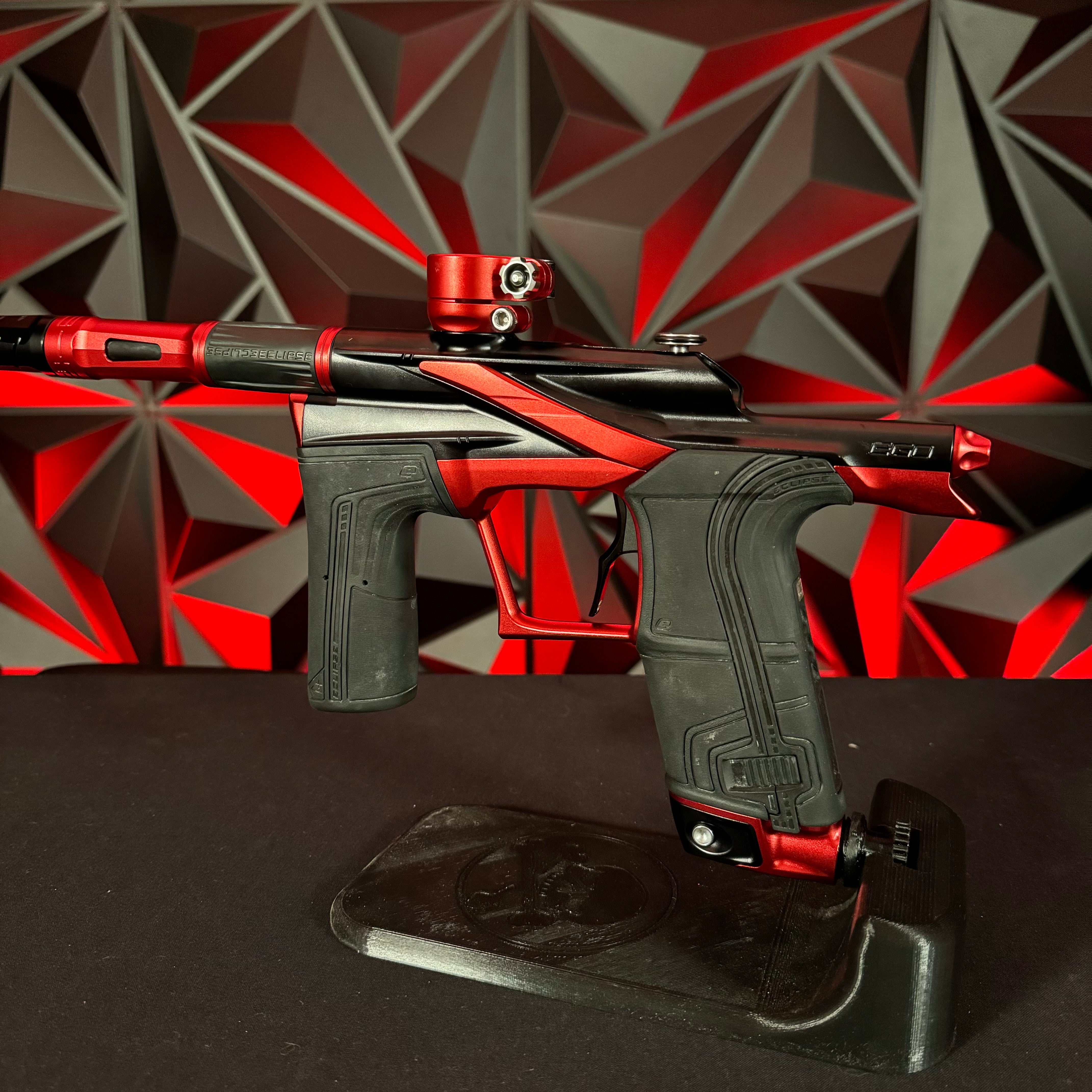 Used Planet Eclipse LV2 Paintball Gun - Black/Red w/ Raptor Deuce Trig