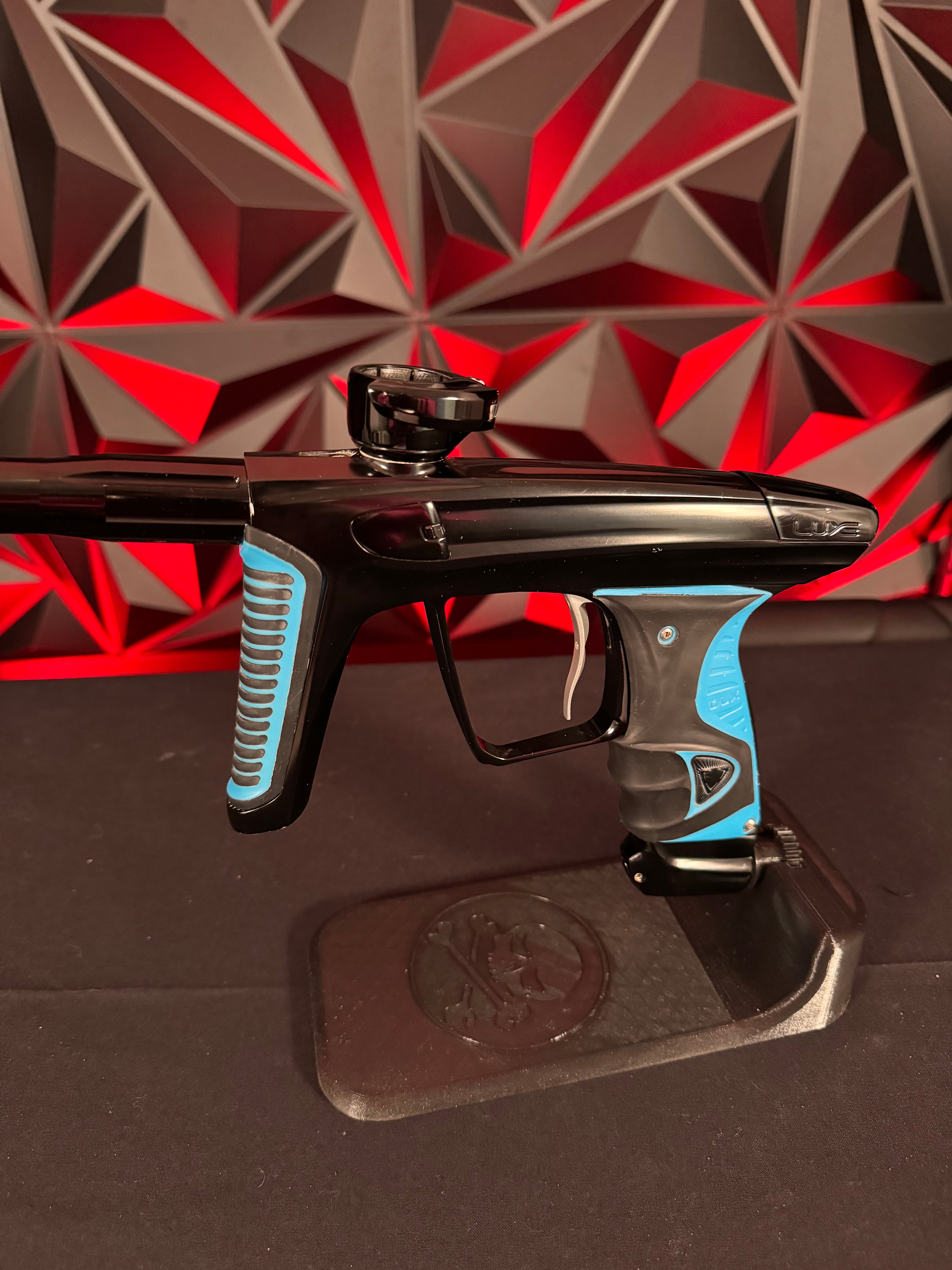 Used DLX Luxe X Paintball Gun - Black w/ Blue Grips