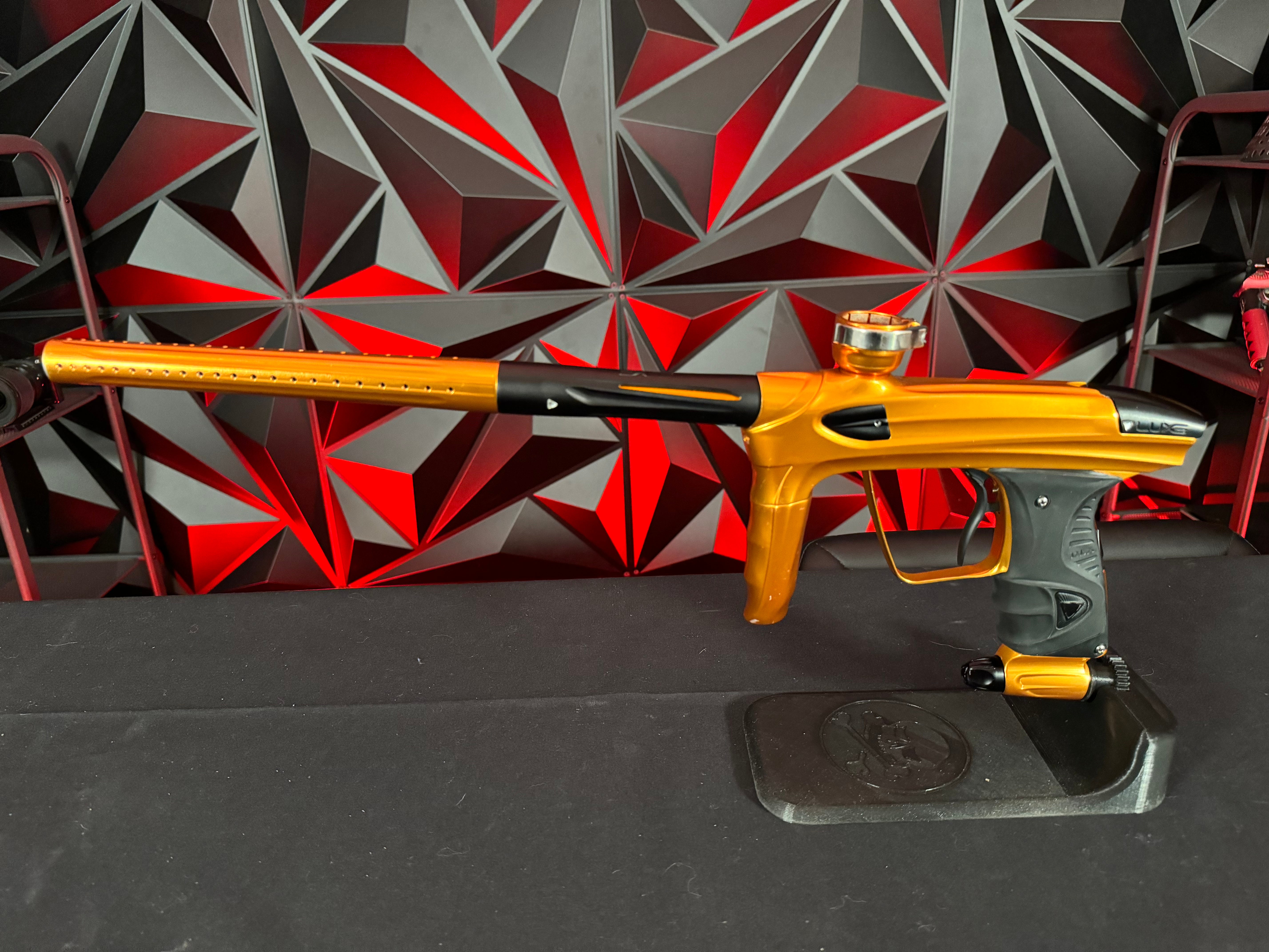 Used DLX Luxe 1.5 Paintball Gun - Polished Orange/Black w/2.0 Bolt