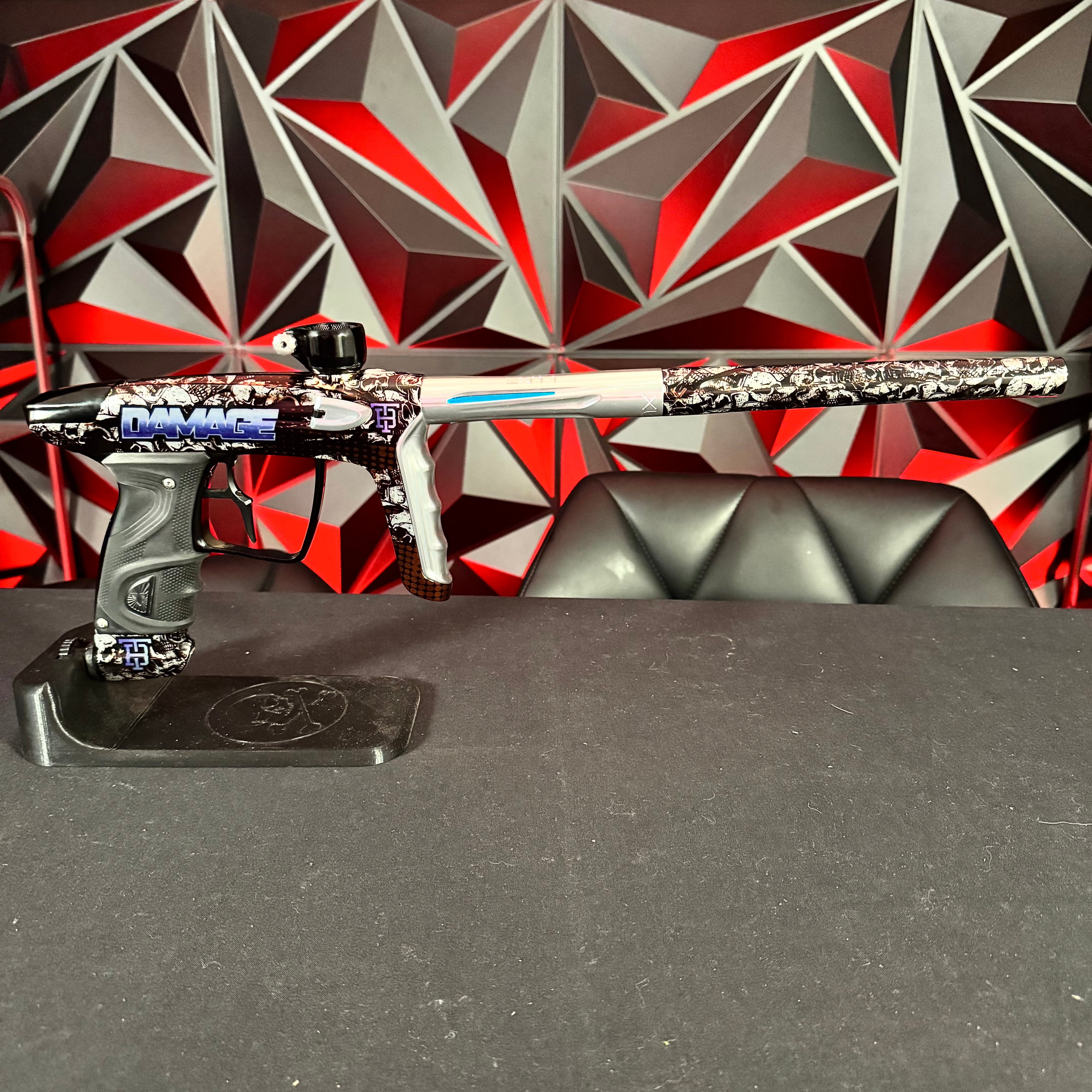 Used DLX Luxe TM40 Paintball Gun - Limited Edition Damage Skulls w/Inf