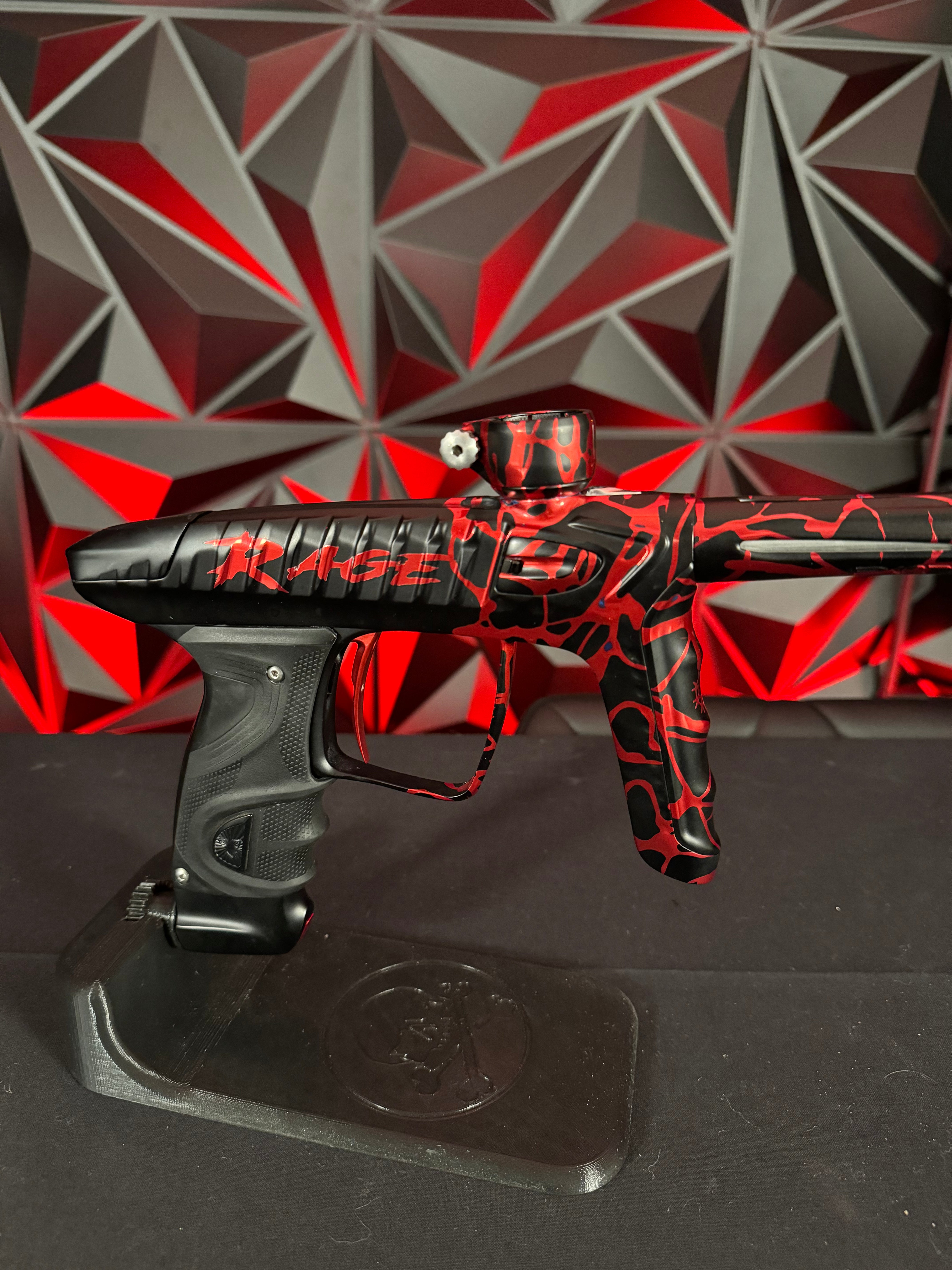 Used DLX LUXE "Project" TM40 Paintball Gun - Rage Black/Red Splash