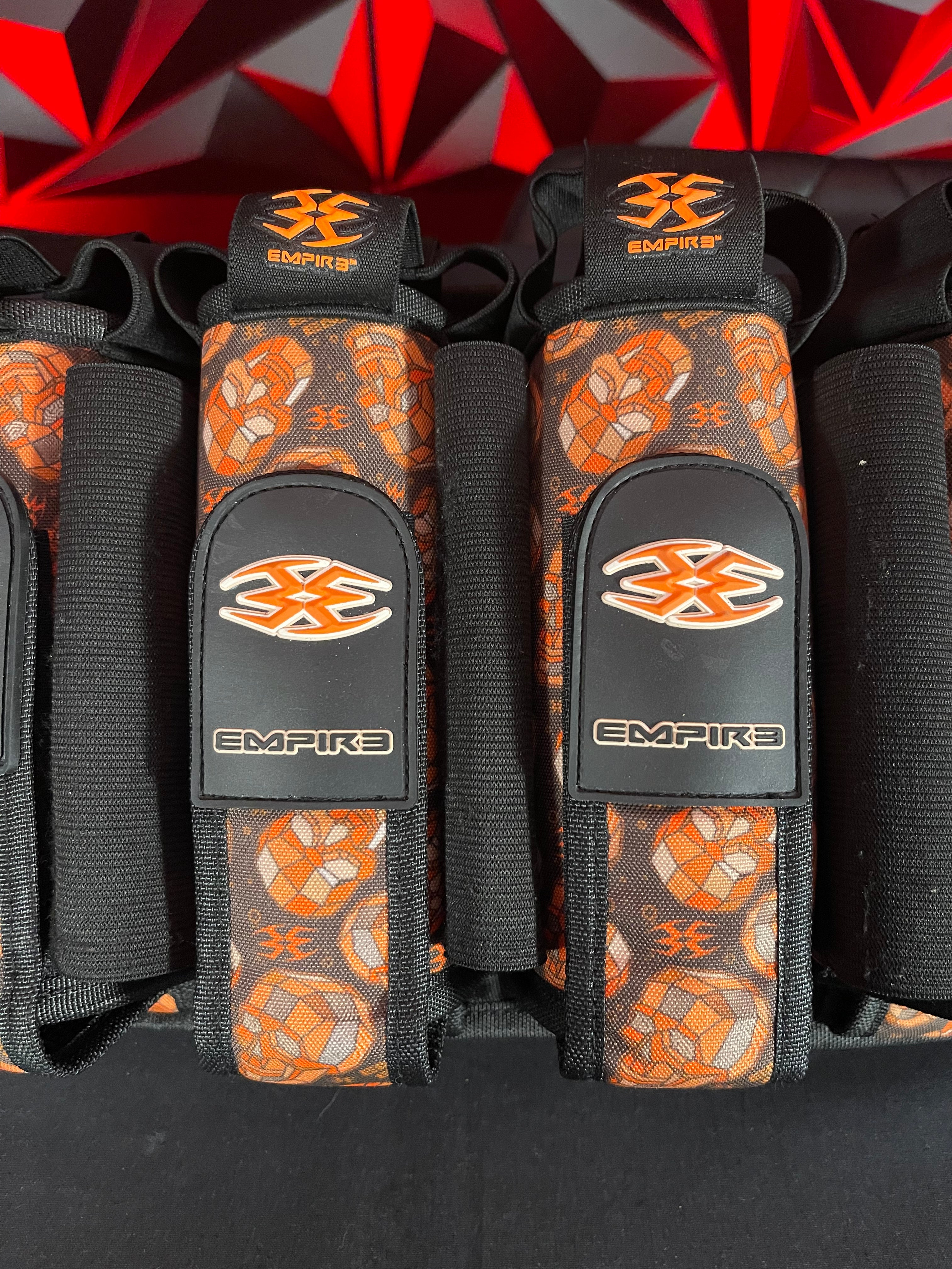 Used Empire 4+5 Paintball Pod Pack- Orange Skull/Black