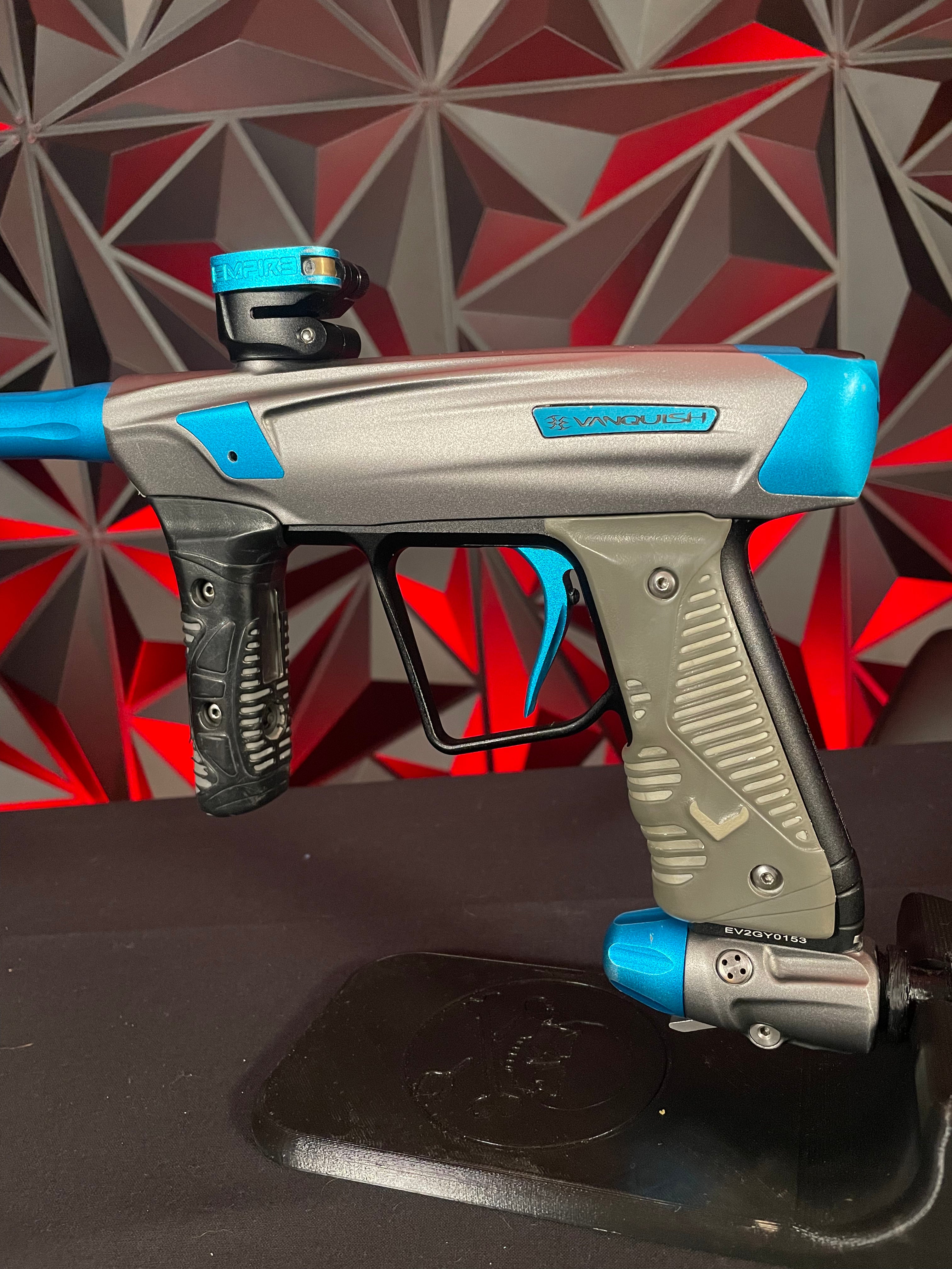Used Empire Vanquish GT Paintball Marker Silver/Blue w/ 4 Barrel Bac