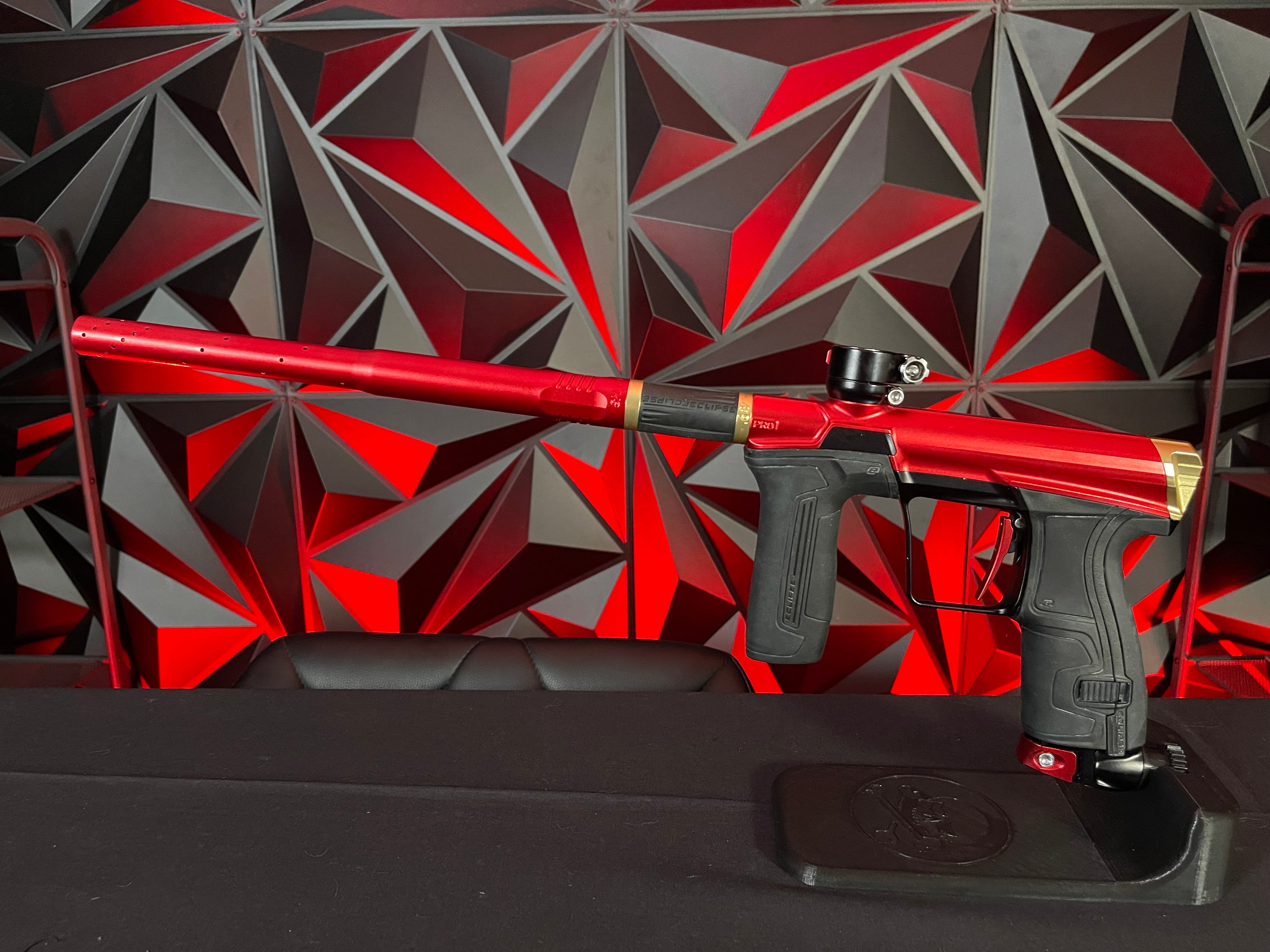 Used Eclipse CS2 Pro Paintball Gun Red/Black/Gold w/ 3 FL Bac
