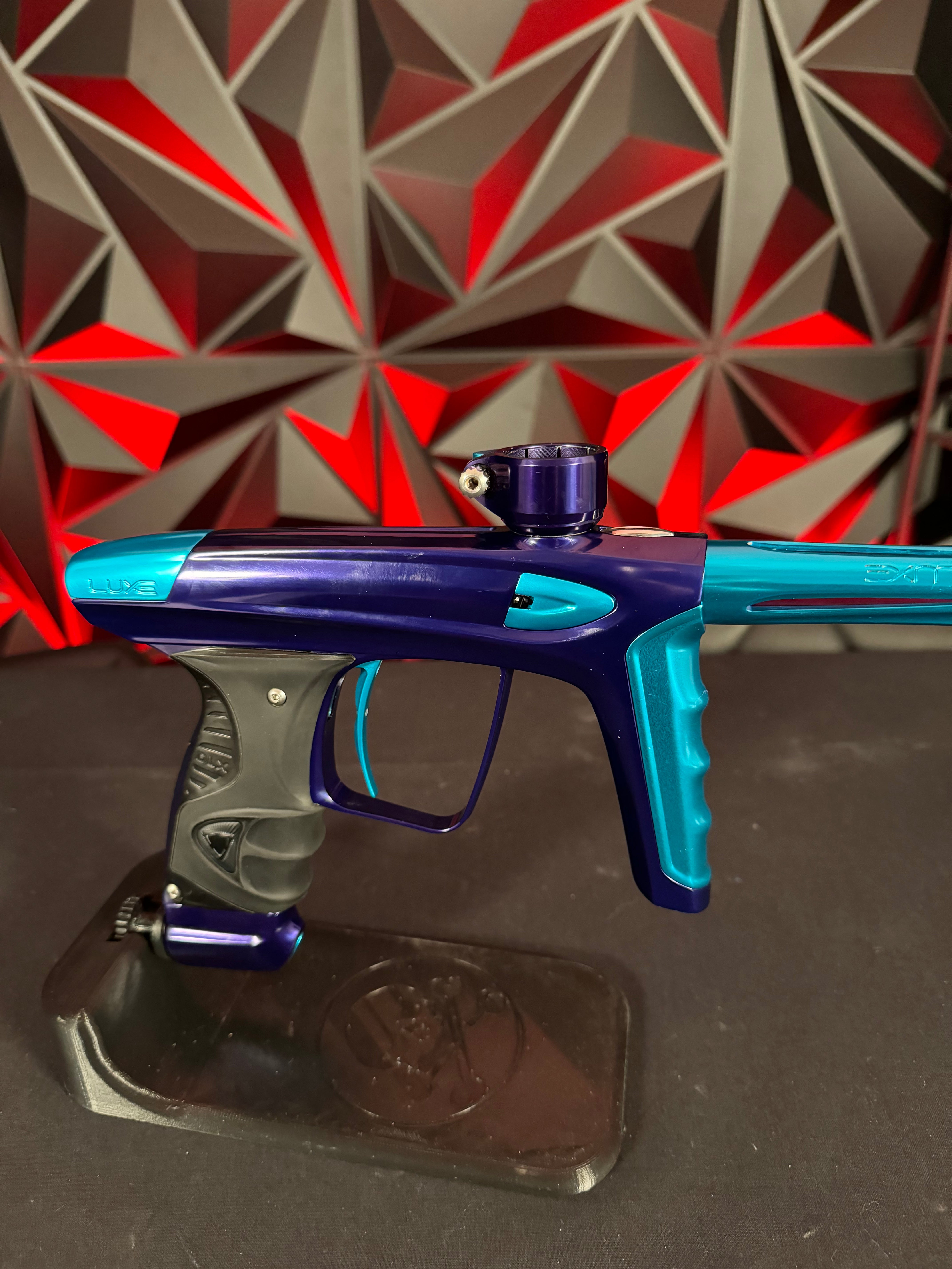 Used DLX Luxe Ice Paintball Gun - Polished Purple / Polished Teal w/ 5 Freak Inserts