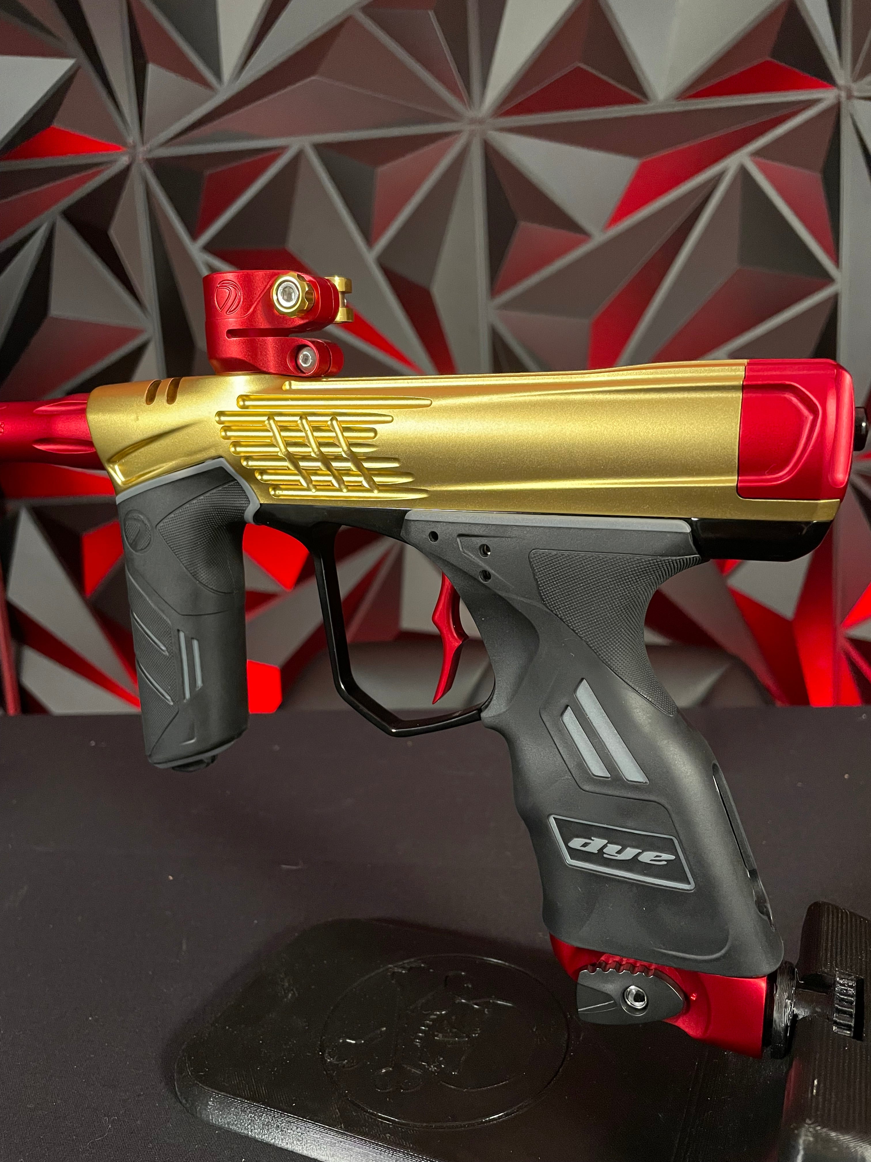 Used Dye DSR+ Paintball Gun - ICON Edition Gold/Red w/ IM Pro Kit