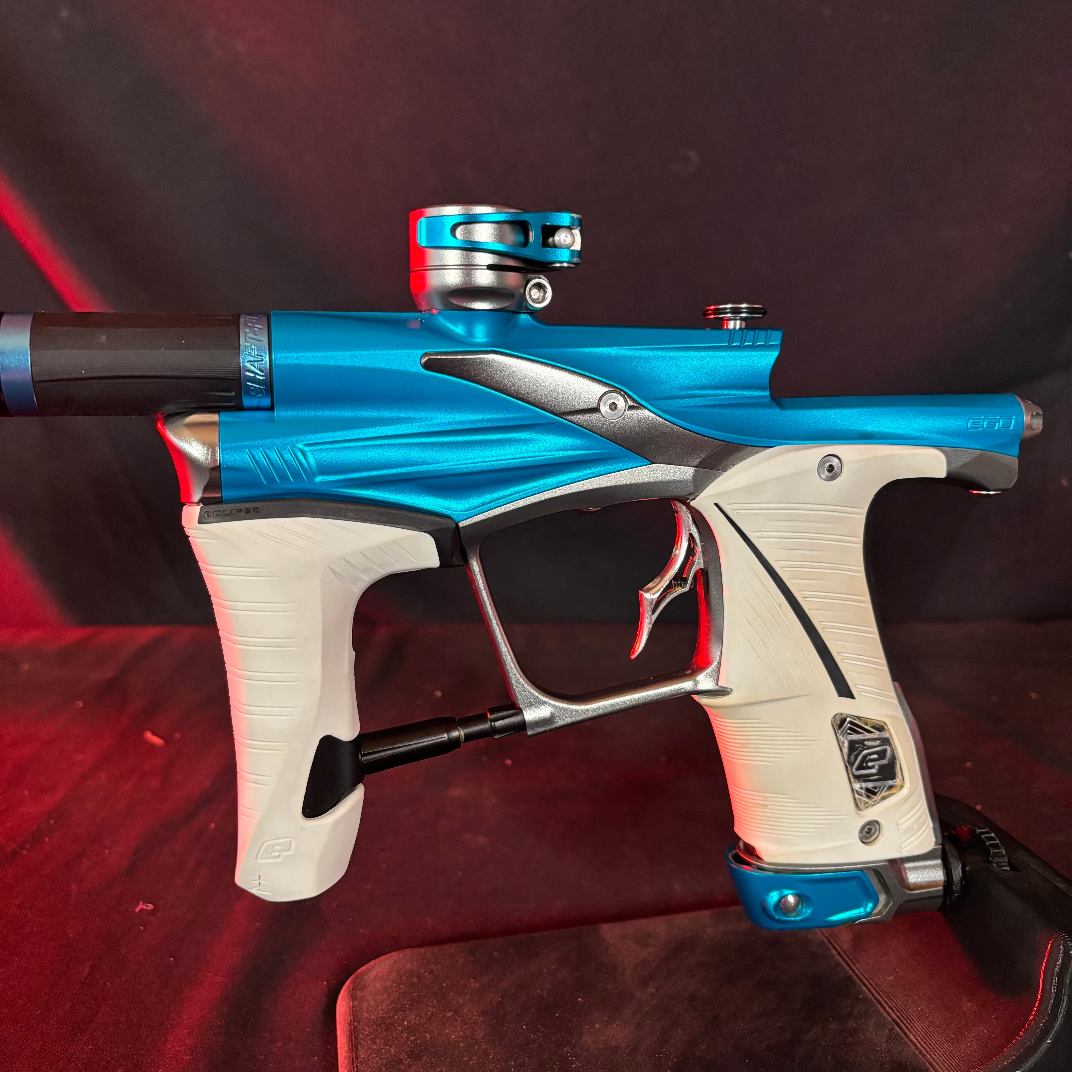 Used Planet Eclipse LV1.6 Paintball Gun - Teal/Pewter w/ White Grips