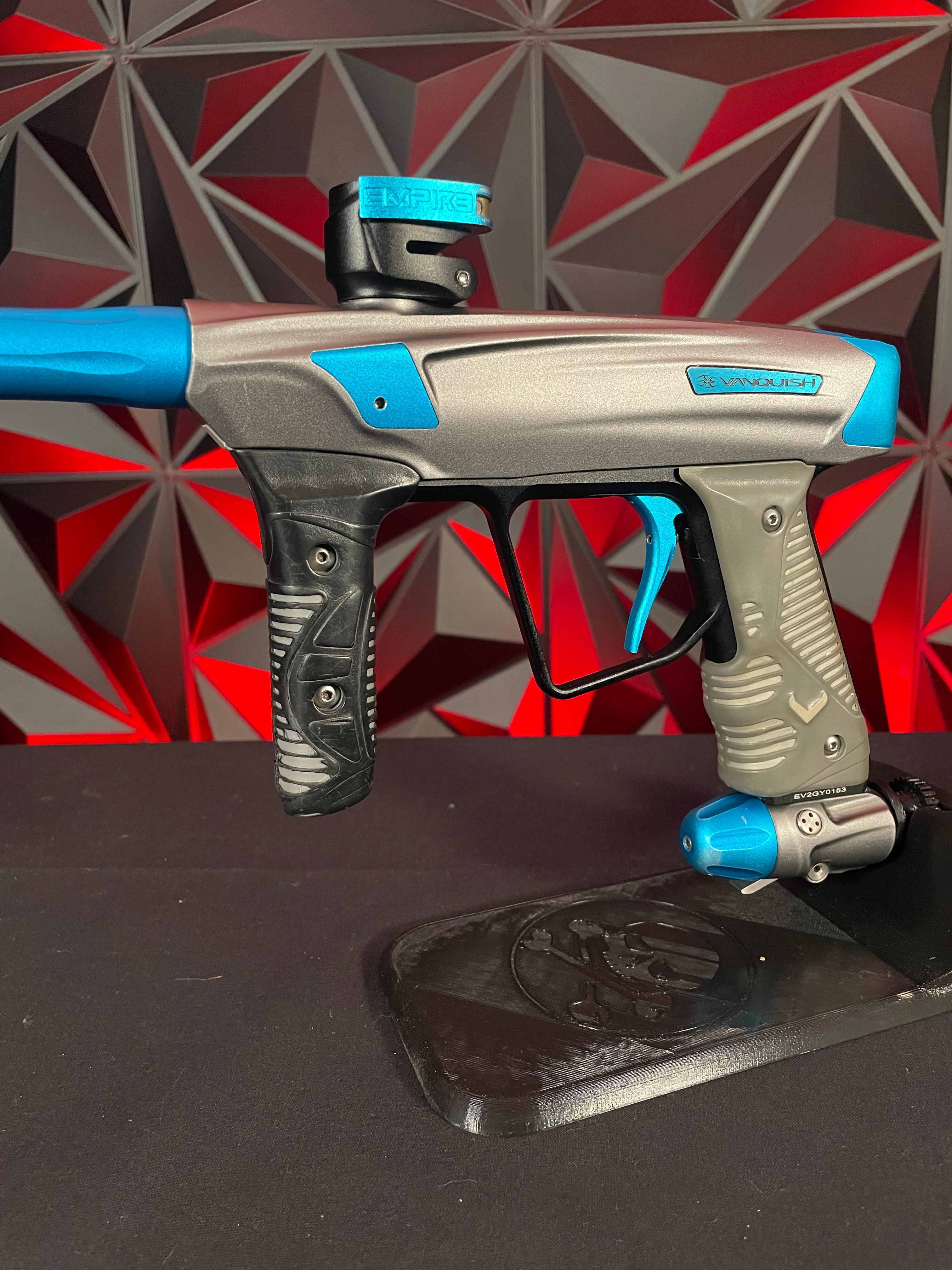 Used Empire Vanquish GT Paintball Marker Silver/Blue w/ 4 Barrel Bac