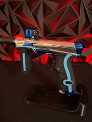 Used Planet Eclipse CS2 Paintball Gun - Silver/Blue w/Carbon Fiber FL Barrel, Scythe Trigger, Extra Set of Grip