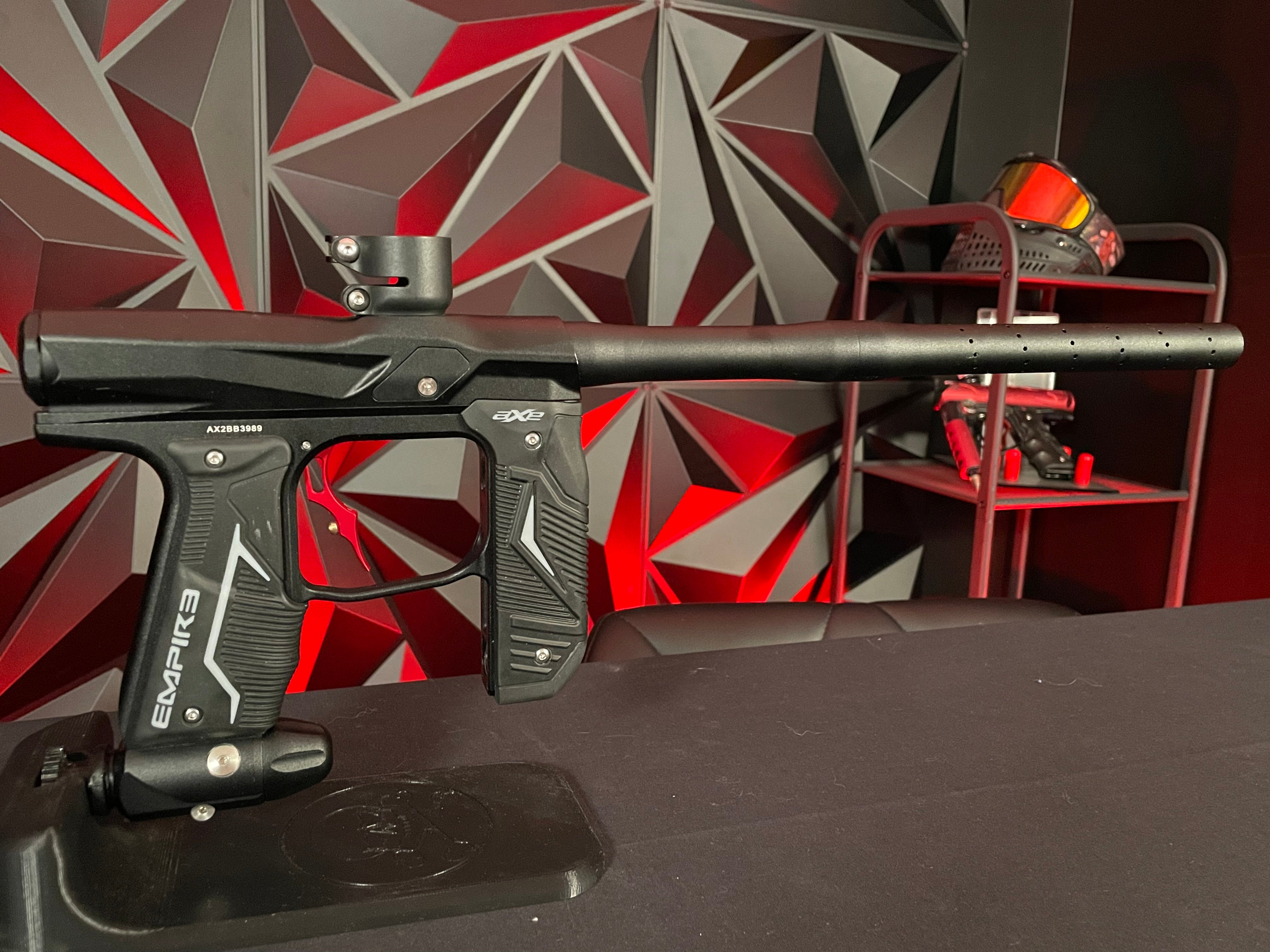 Used Empire Axe 2.0 Paintball Gun - Black w/ Redline Board & Red Deuce Trigger