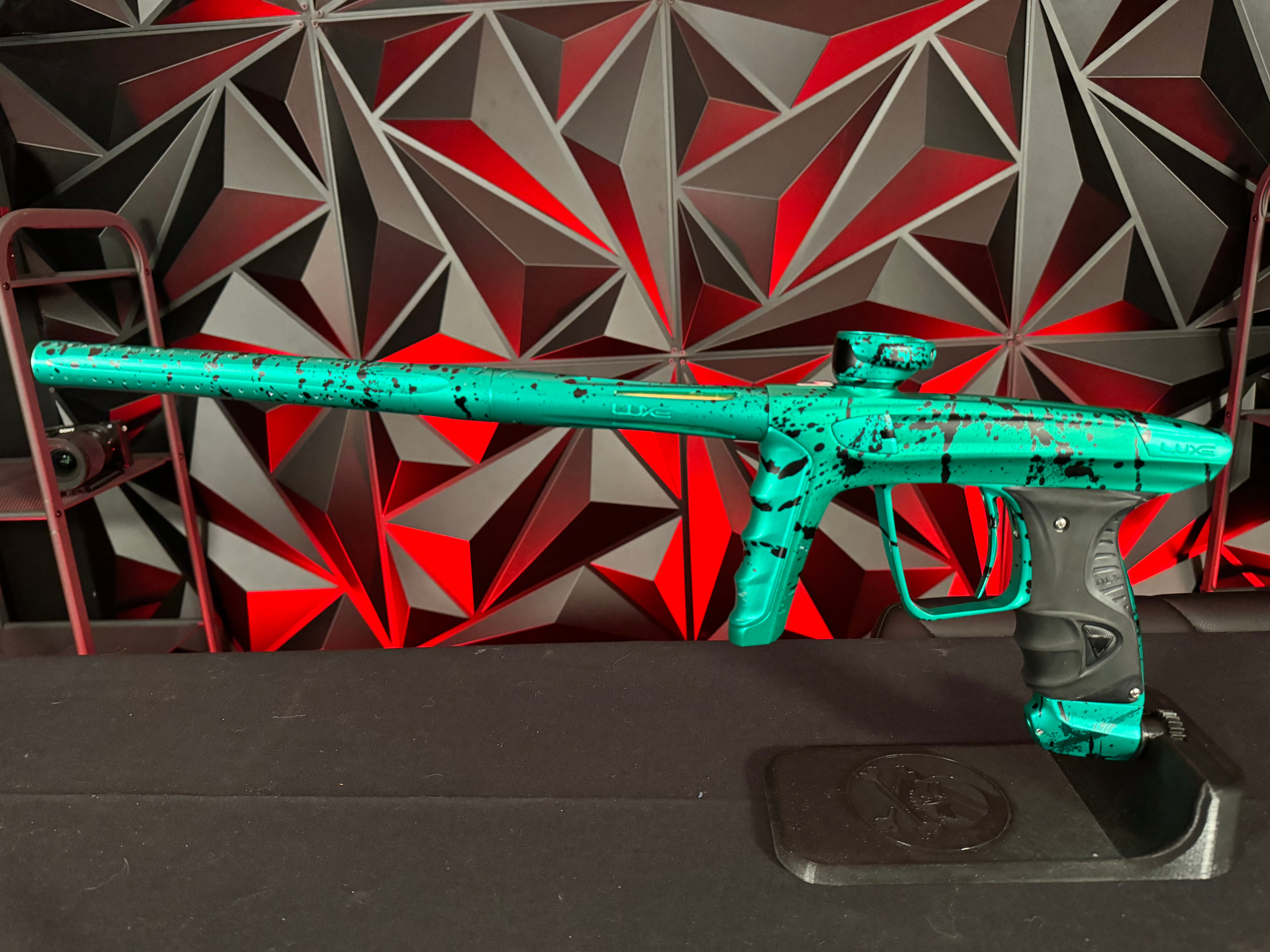 Used DLX Luxe X Paintball Gun - Green Splash