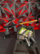 Used Planet Eclipse CS2 Pro Paintball Gun - Black w/ Gold Infamous FL Tip, 2 FL Backs, and Spare Black/White Grip Kit