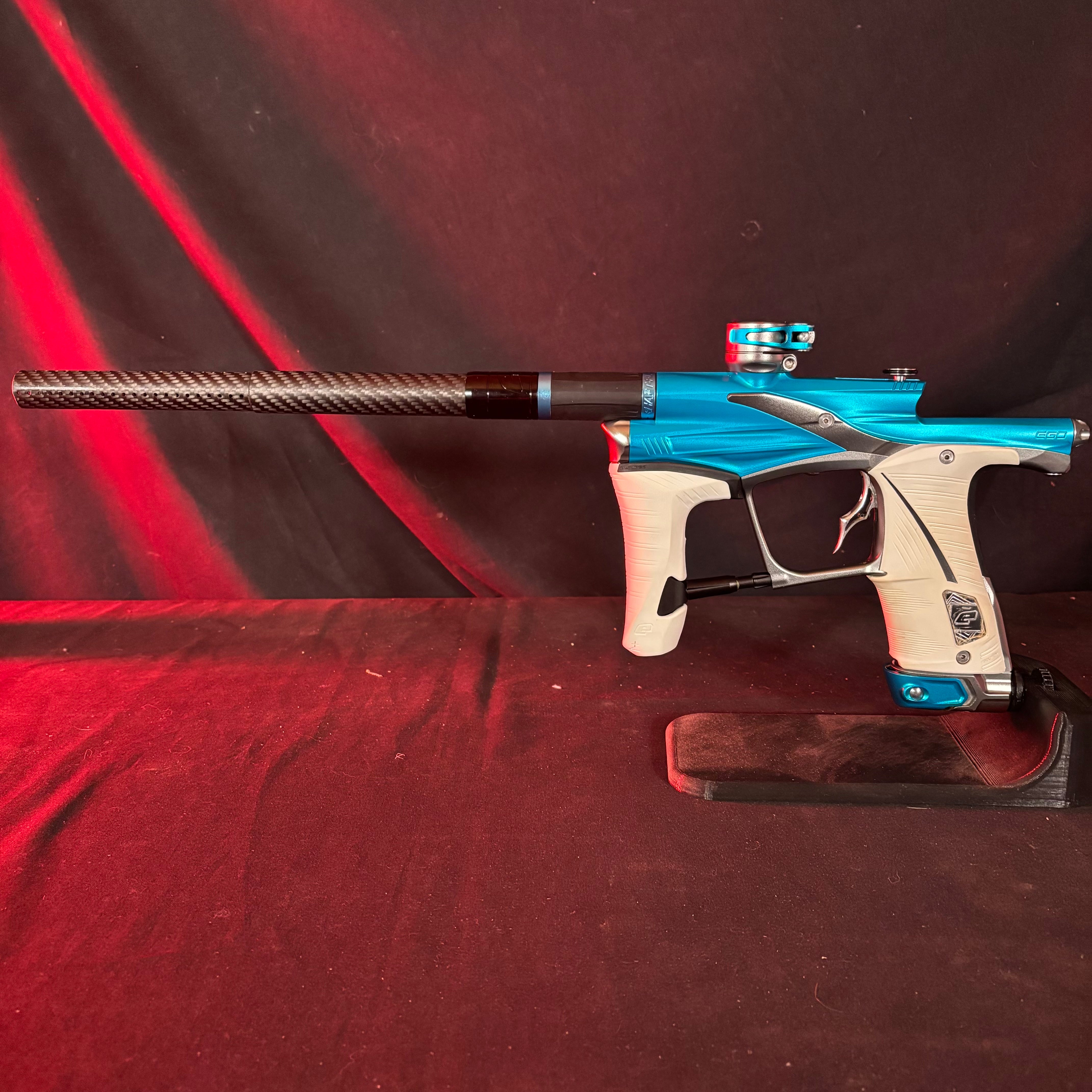 Used Planet Eclipse LV1.6 Paintball Gun - Teal/Pewter w/ White Grips