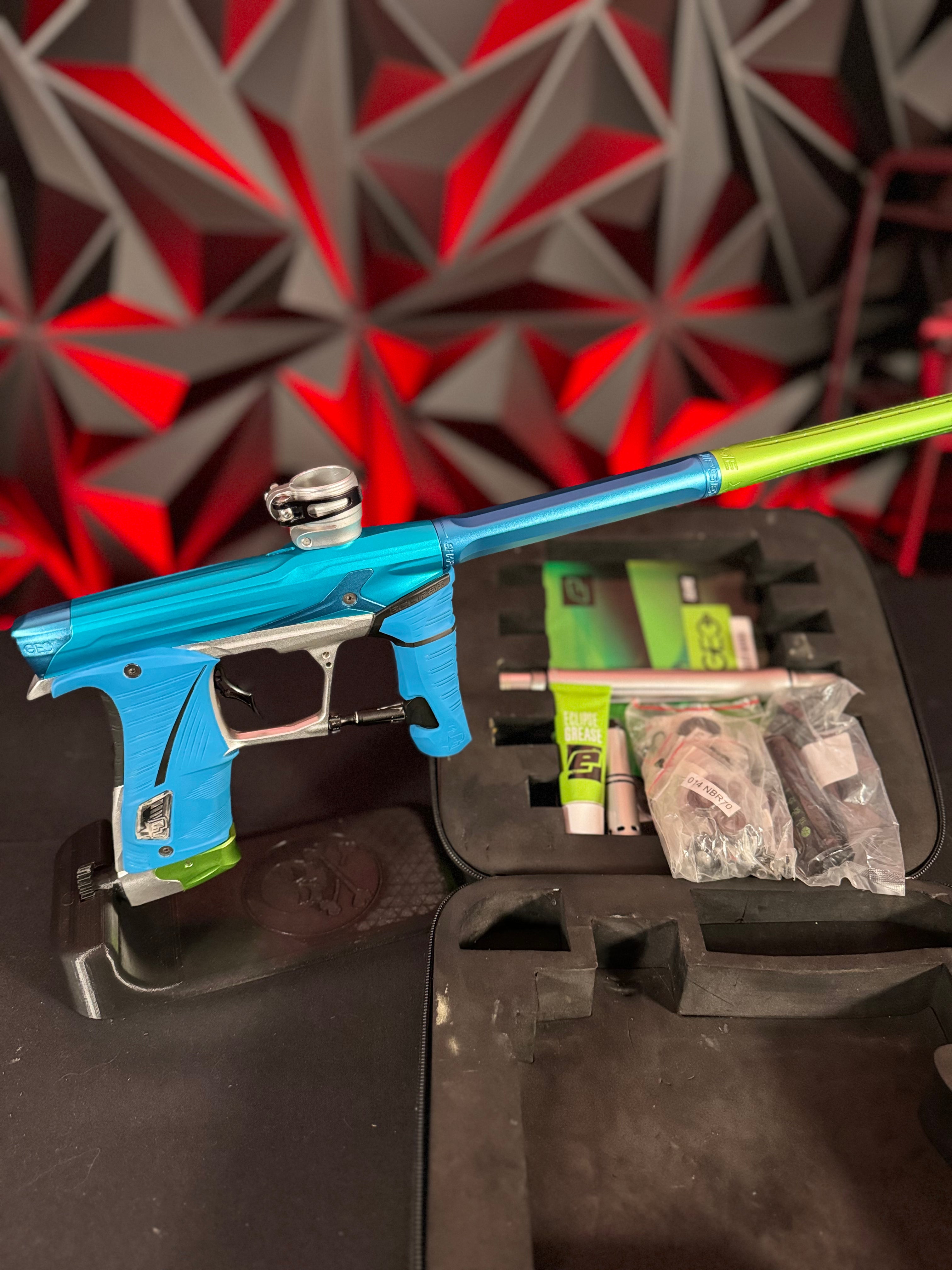 Used Planet Eclipse Geo 3.5 Paintball Gun - Teal/Silver/Green w/Infamous Deuce Trigger