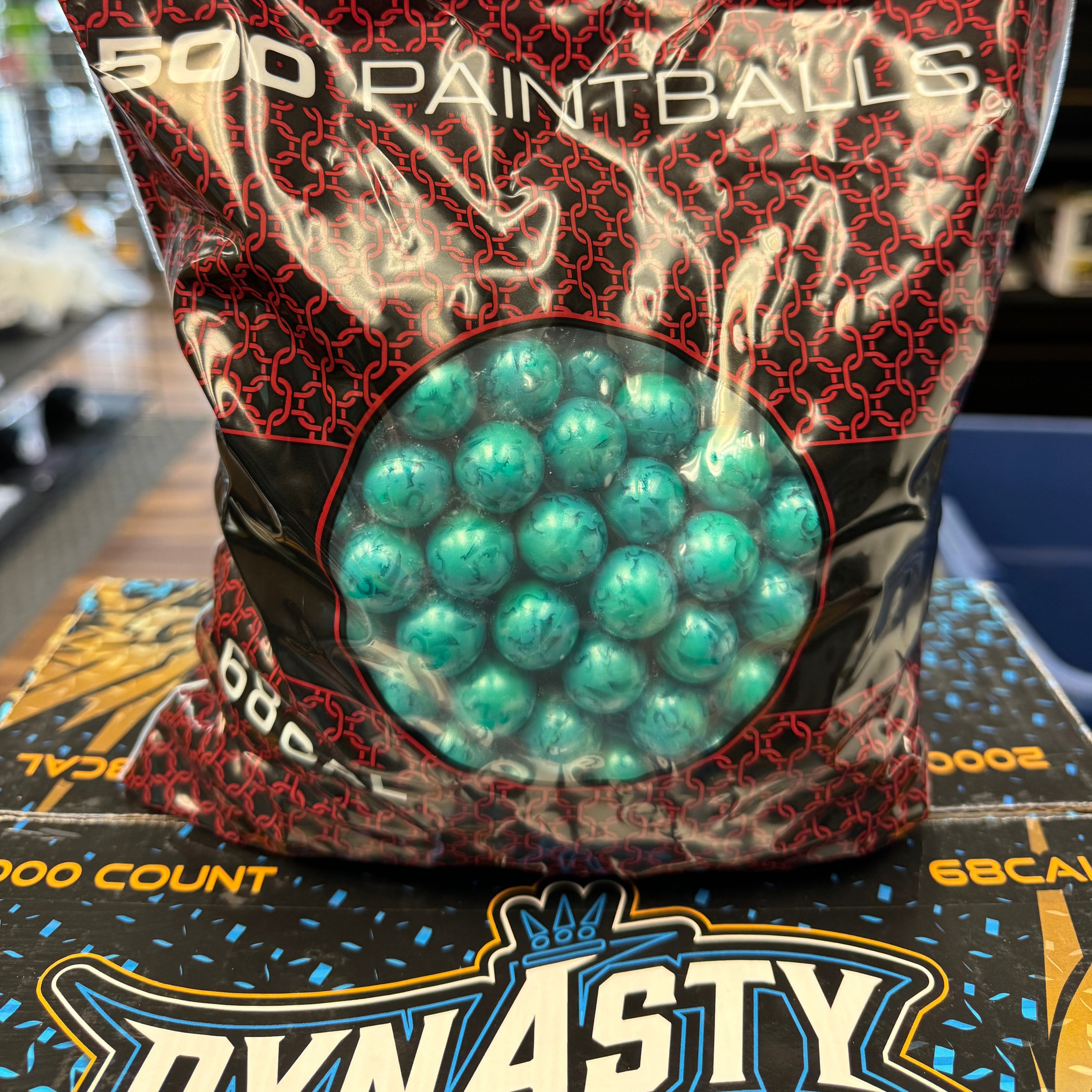 GI Sportz/Dynasty Pro Team Paintballs - 2000 Paintballs - Aqua Metallic Shell - Yellow Fill *BANANA SCENT*