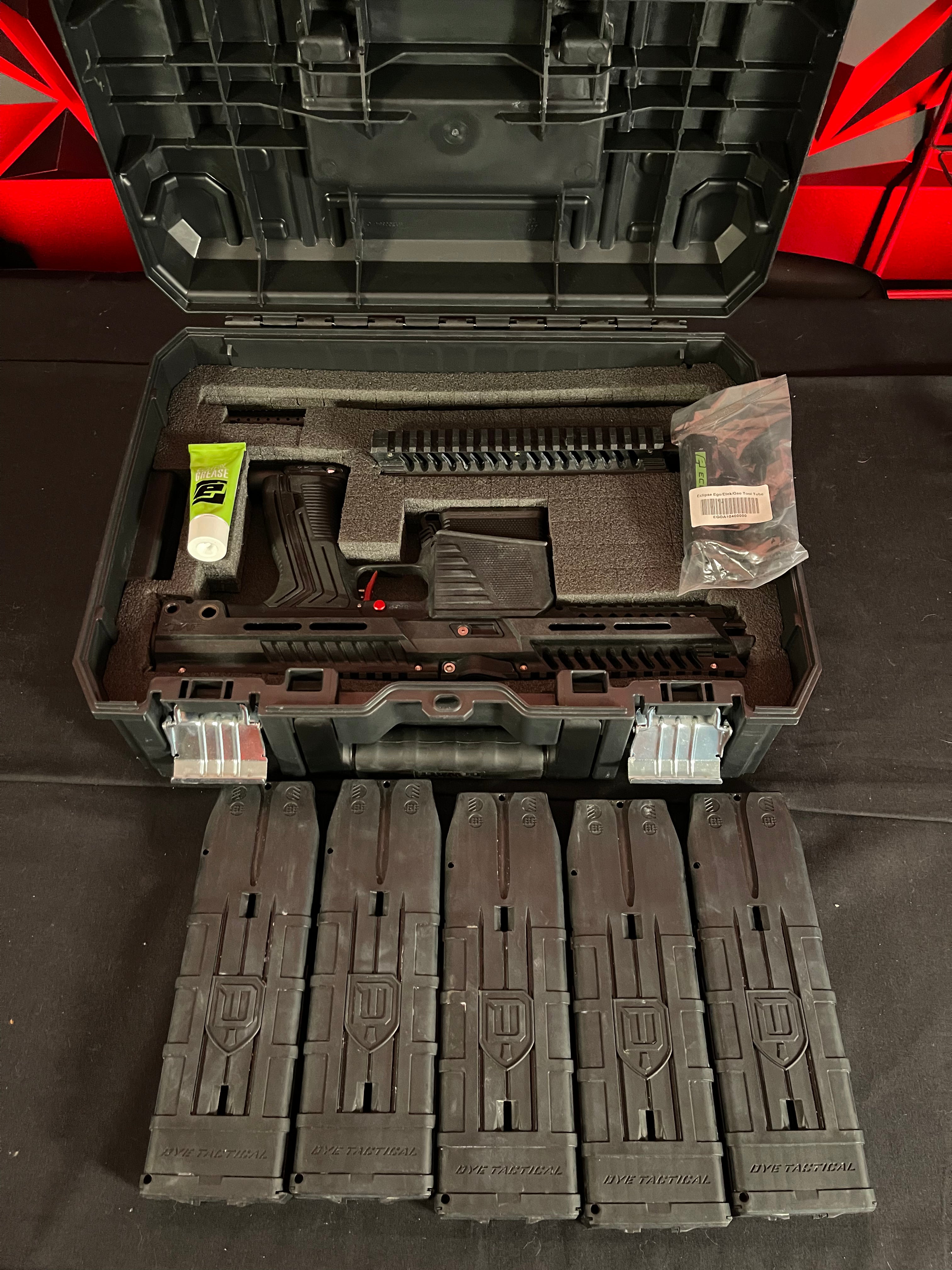 Used Eclipse EMF100 Paintball Gun Black w/ Red Trigger & 5 CF