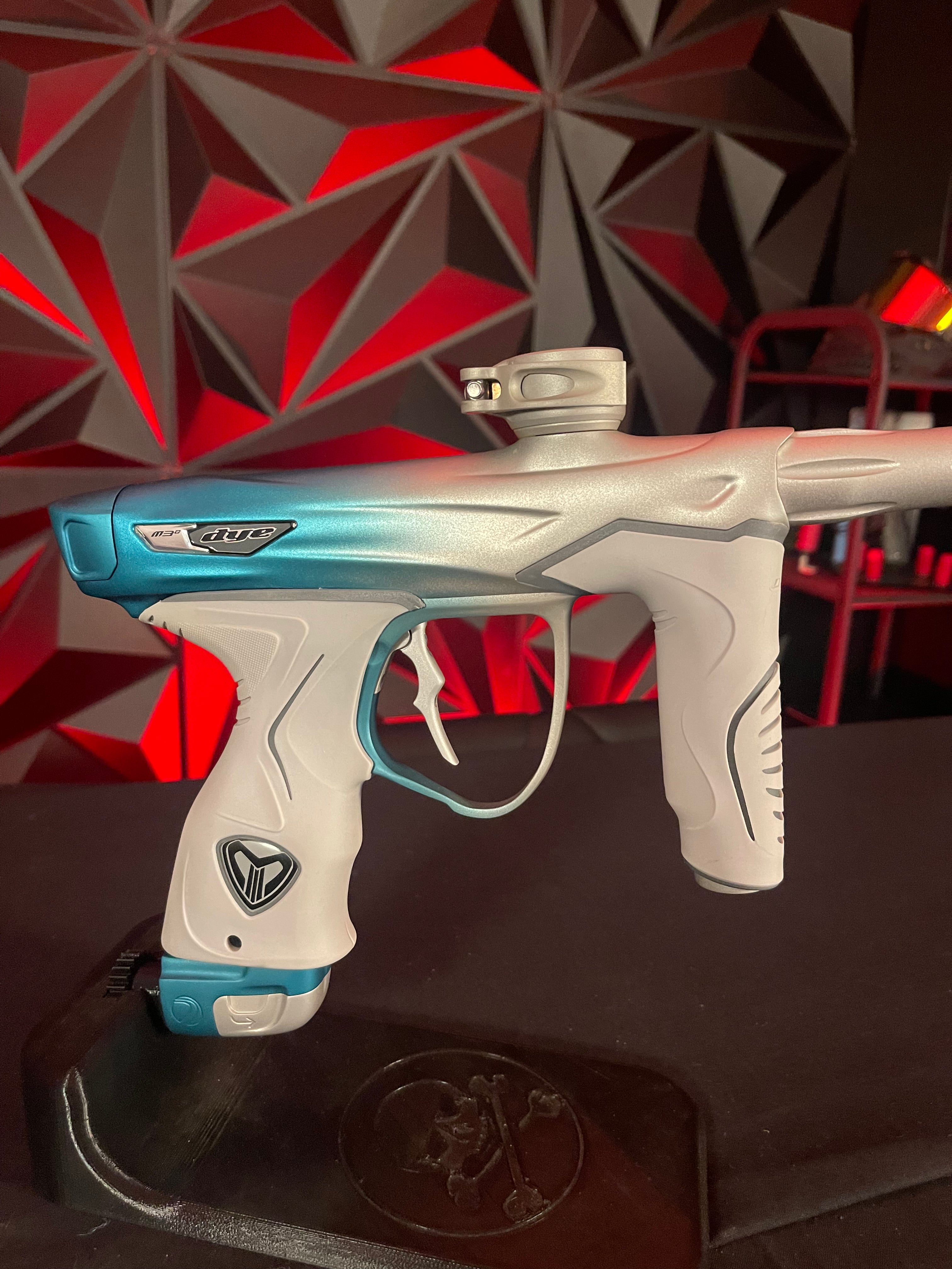 Used Dye M3+ Paintball Gun - Custom Blue to Silver Fade w/ Wireless Charging Pad