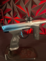 Used Dye DSR Paintball Gun - Freeze (Cyan/Clear Fade) w/ Flex Face Bolt, 2 Extra Feedneck, Extra Grips, NASA Bolt and Stock Can, 3 Barrel Backs