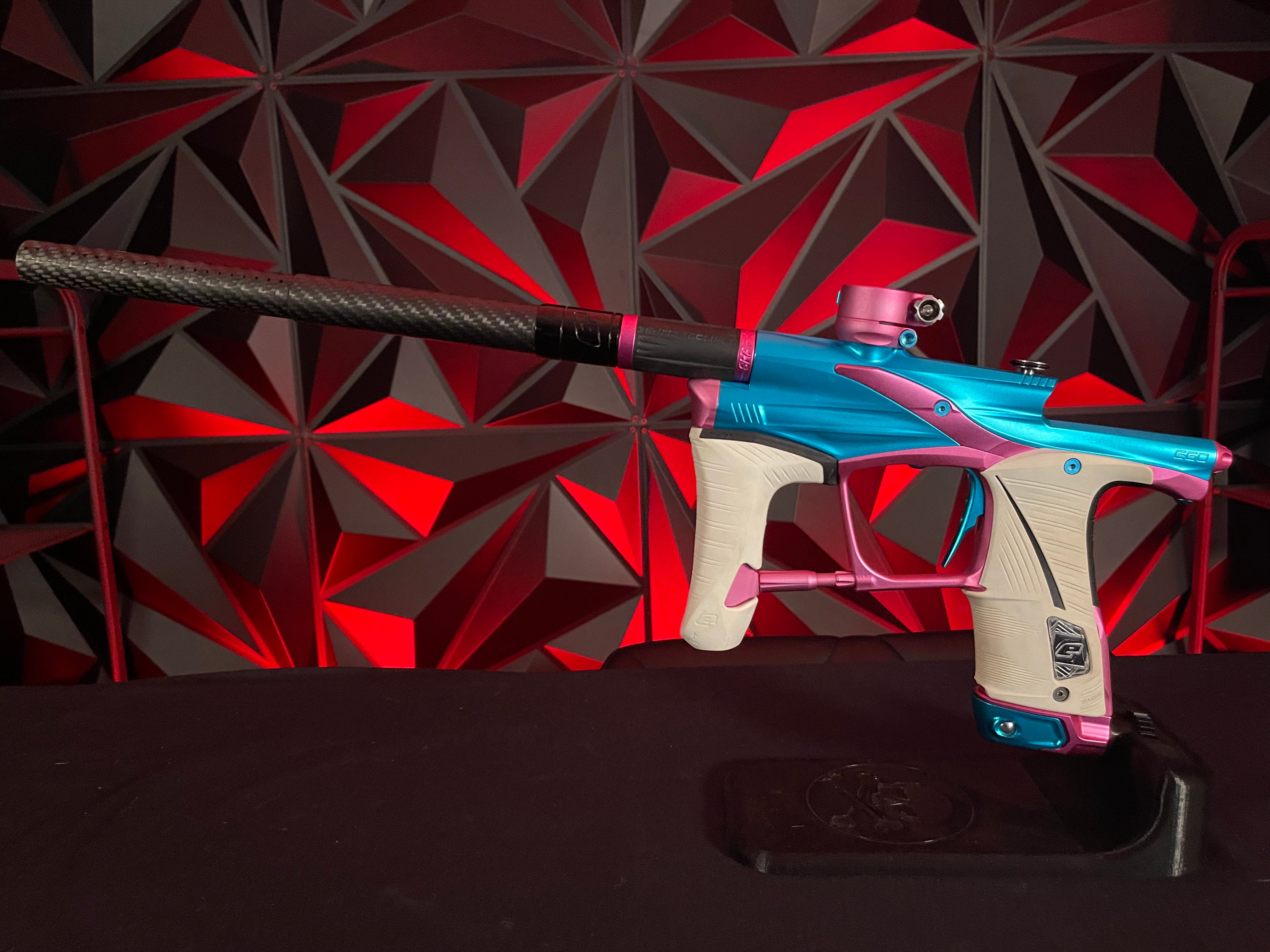 Used Planet Eclipse LV1.6 Paintball Gun - Teal / Pink w/White Grip Kit