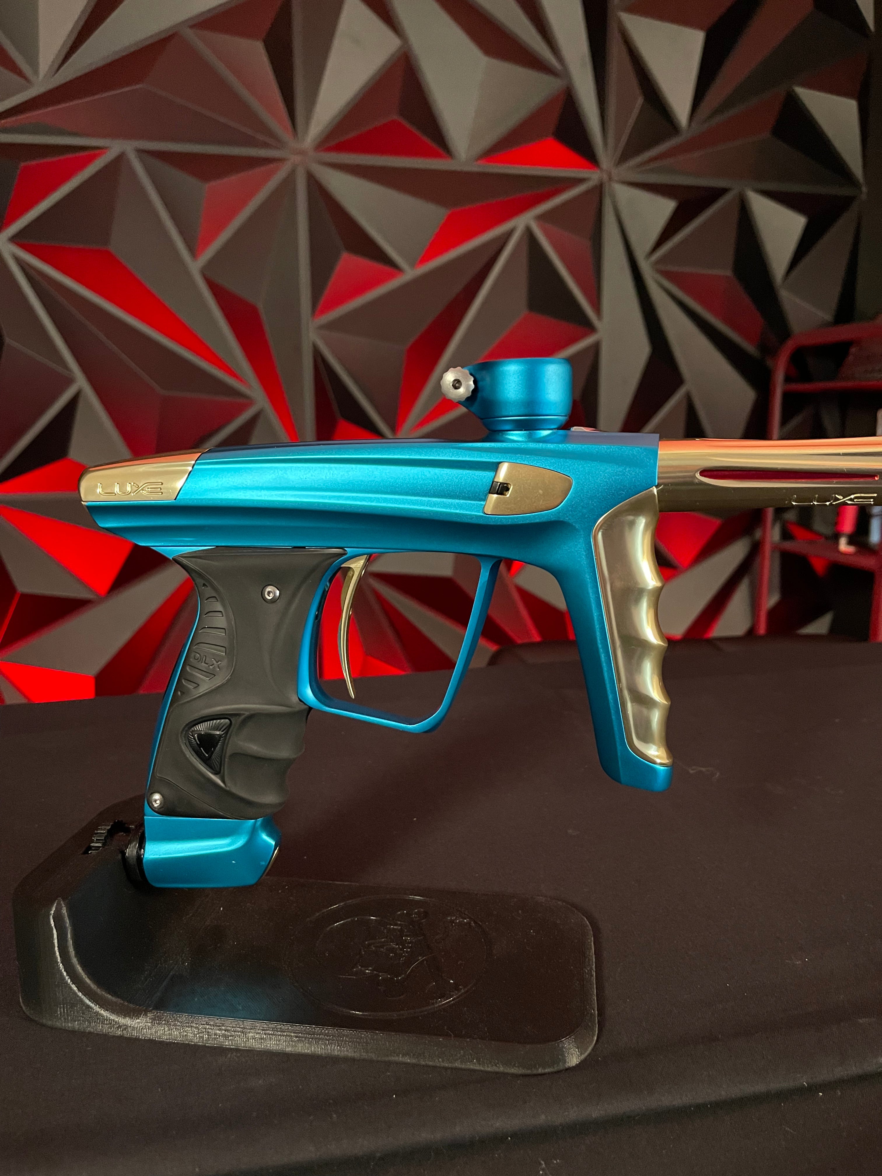 Used DLX Luxe X Paintball Gun - Dust Teal / Polished Gold