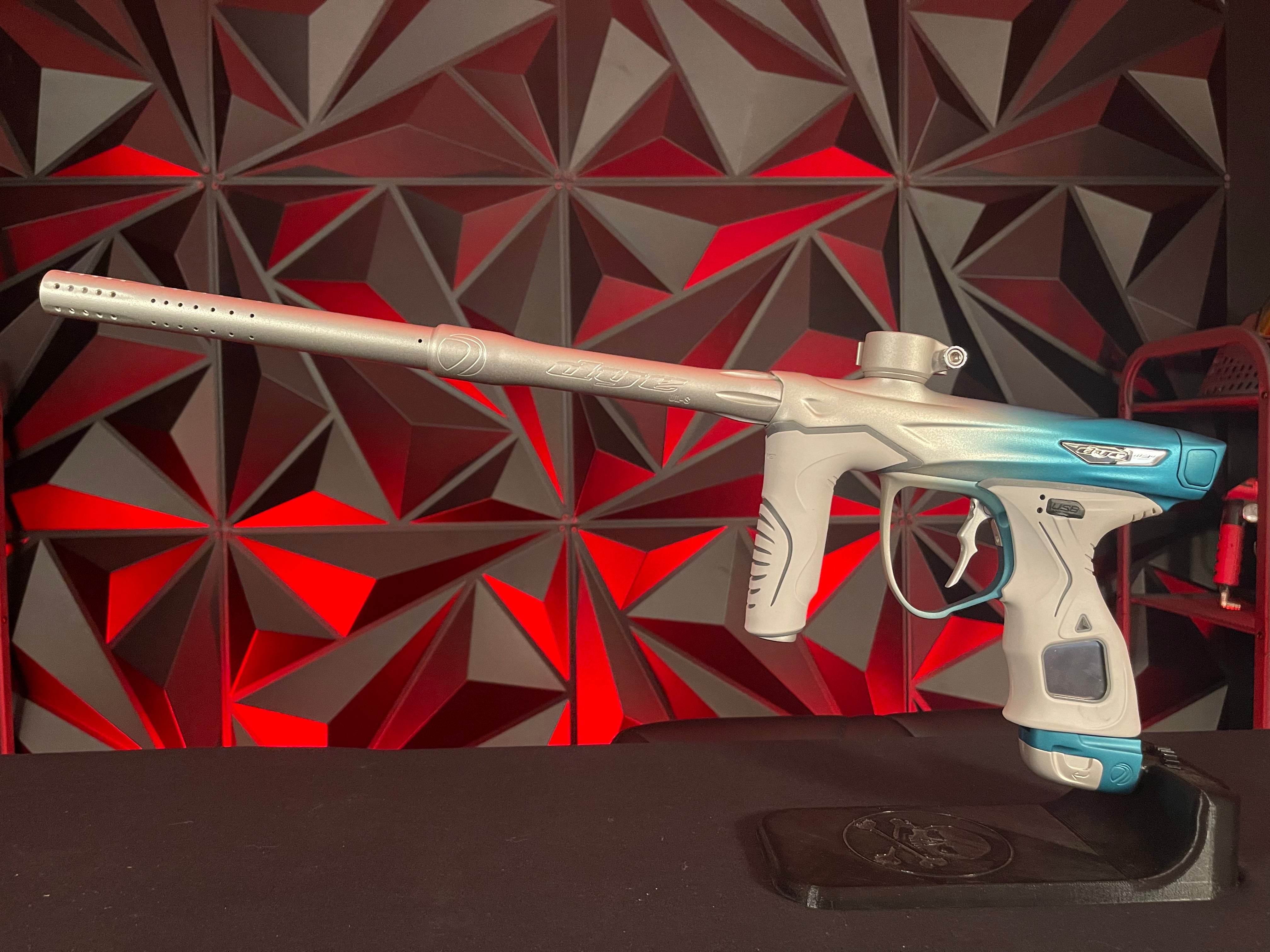 Used Dye M3+ Paintball Gun - Custom Blue to Silver Fade w/ Wireless Charging Pad