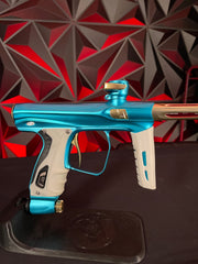 Used Shocker XLS Paintball Gun - Dust Teal / Polished Gold