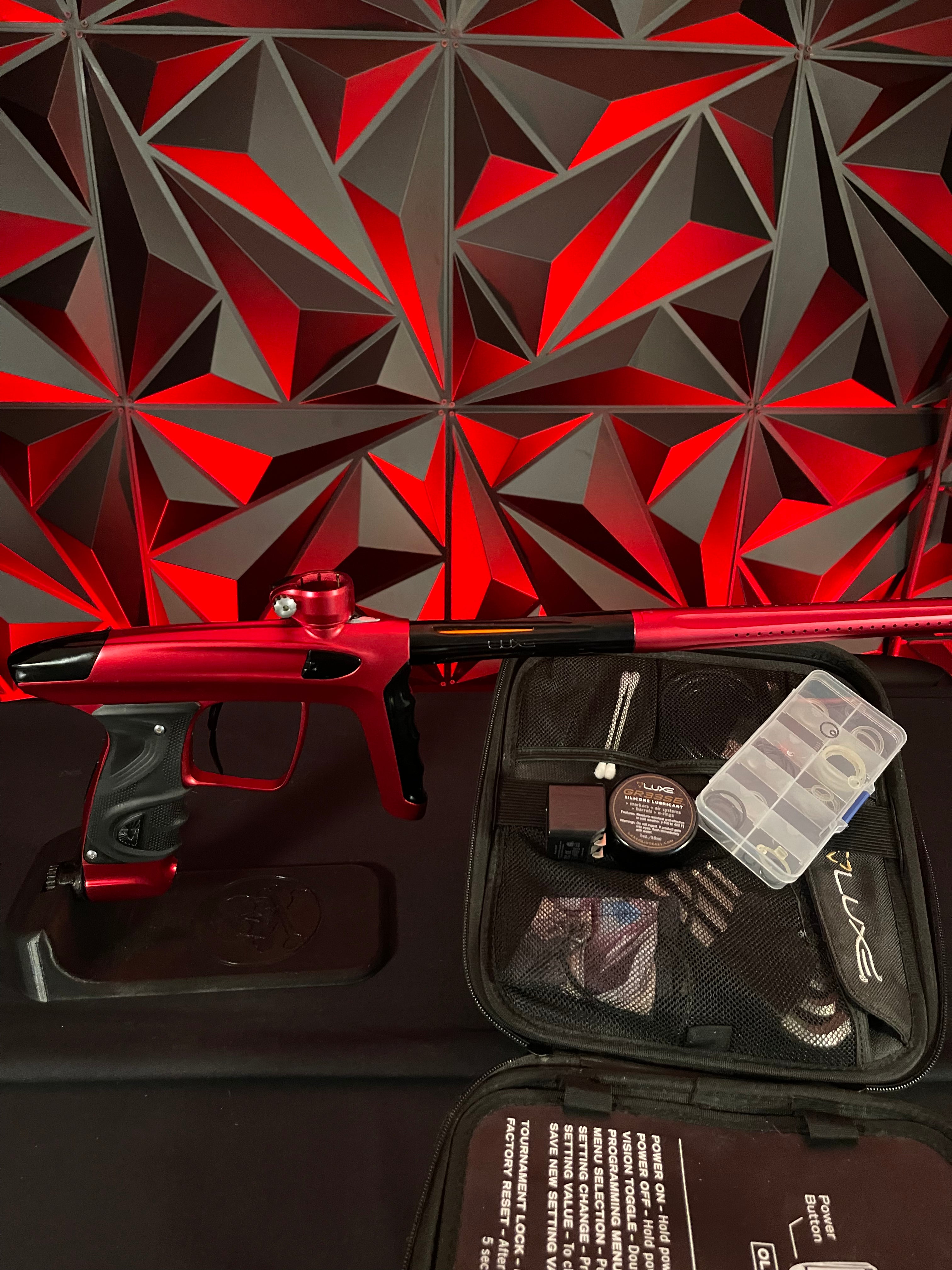 Used DLX Luxe TM40 Paintball Gun- Dust Red/Polished Black