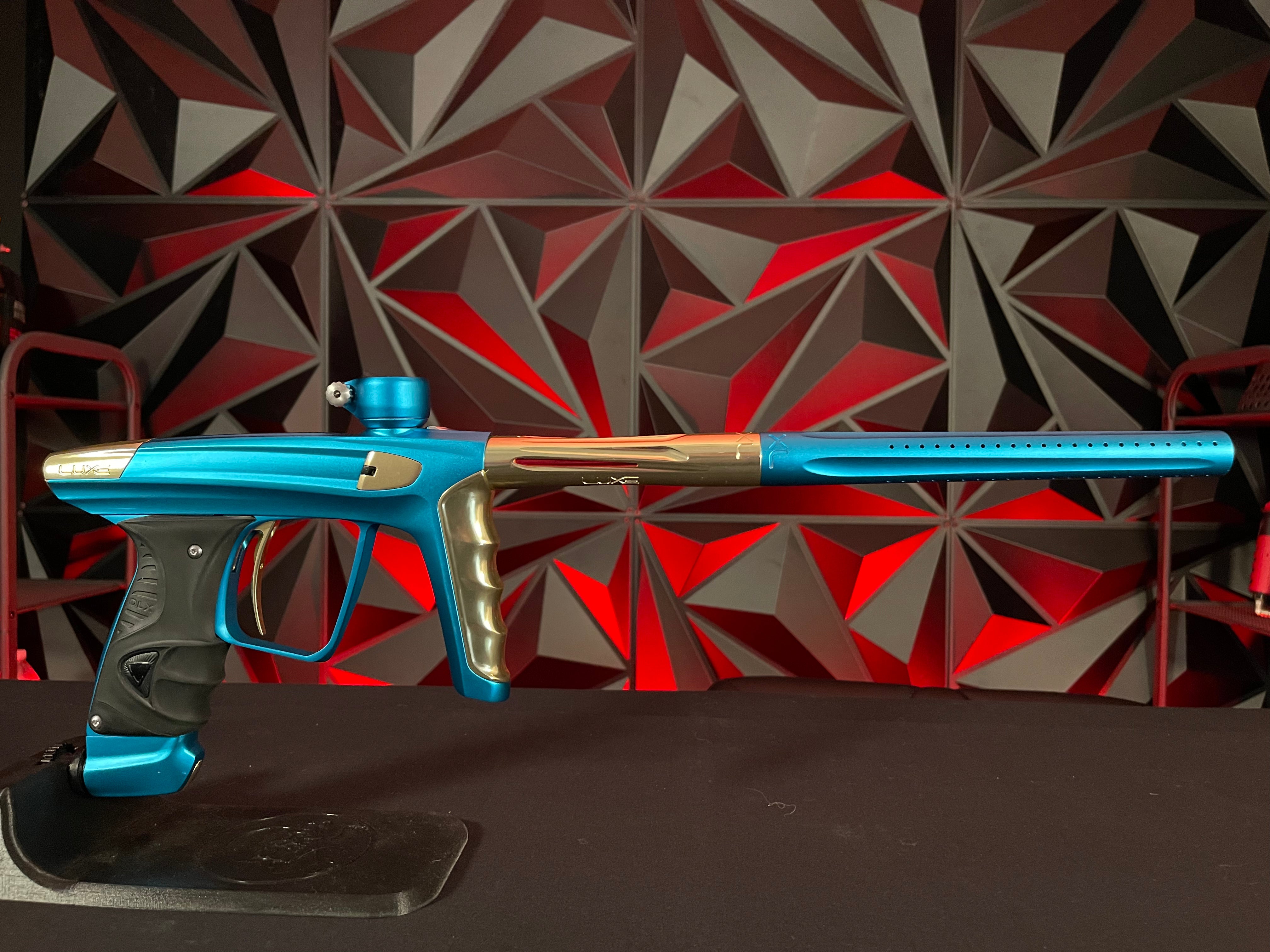 Used DLX Luxe X Paintball Gun - Dust Teal / Polished Gold